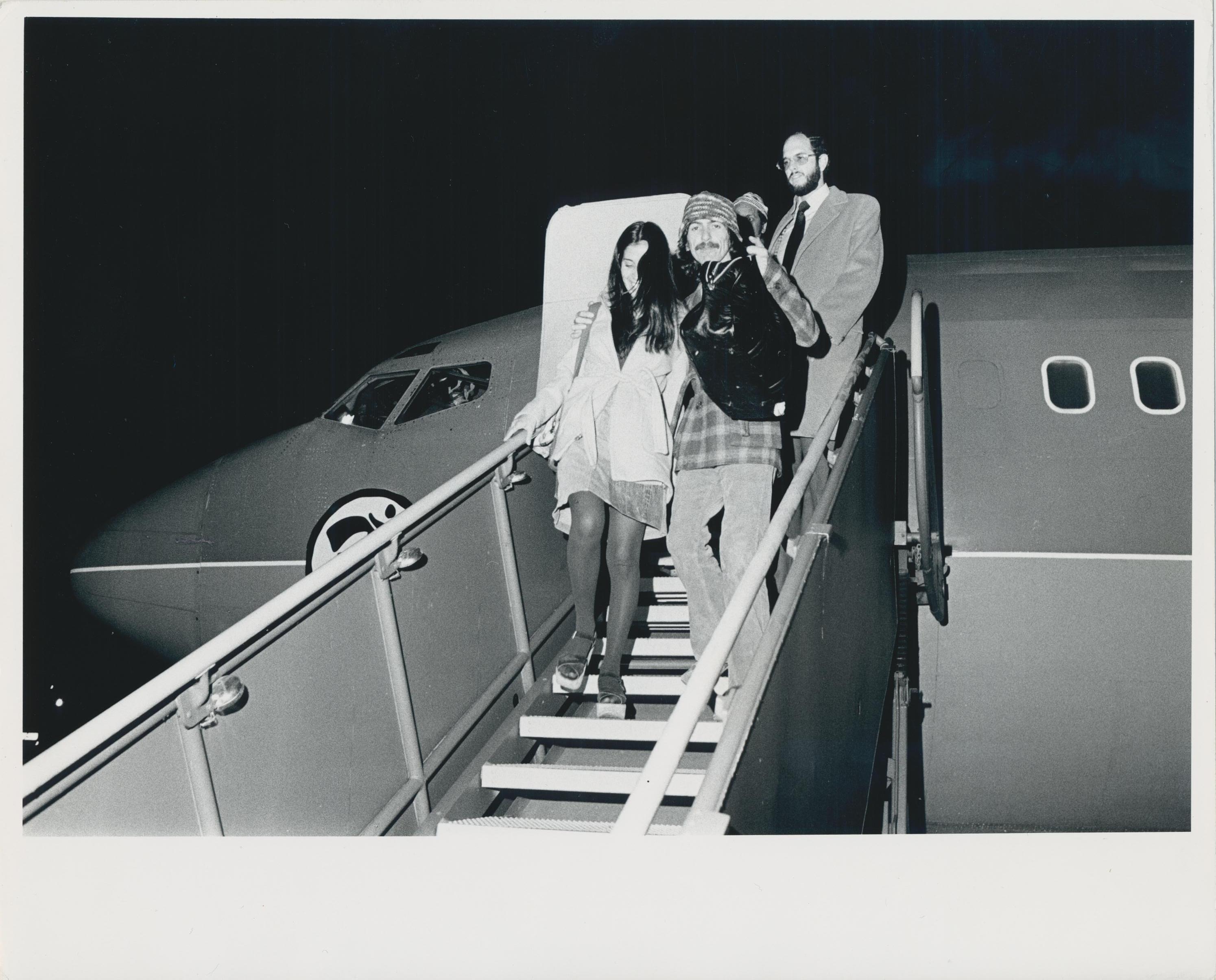 Henry Grossman Portrait Photograph - Geroge Harrison, Plane, Black and White Photography, 1970s, 20, 8 x 25, 3 cm