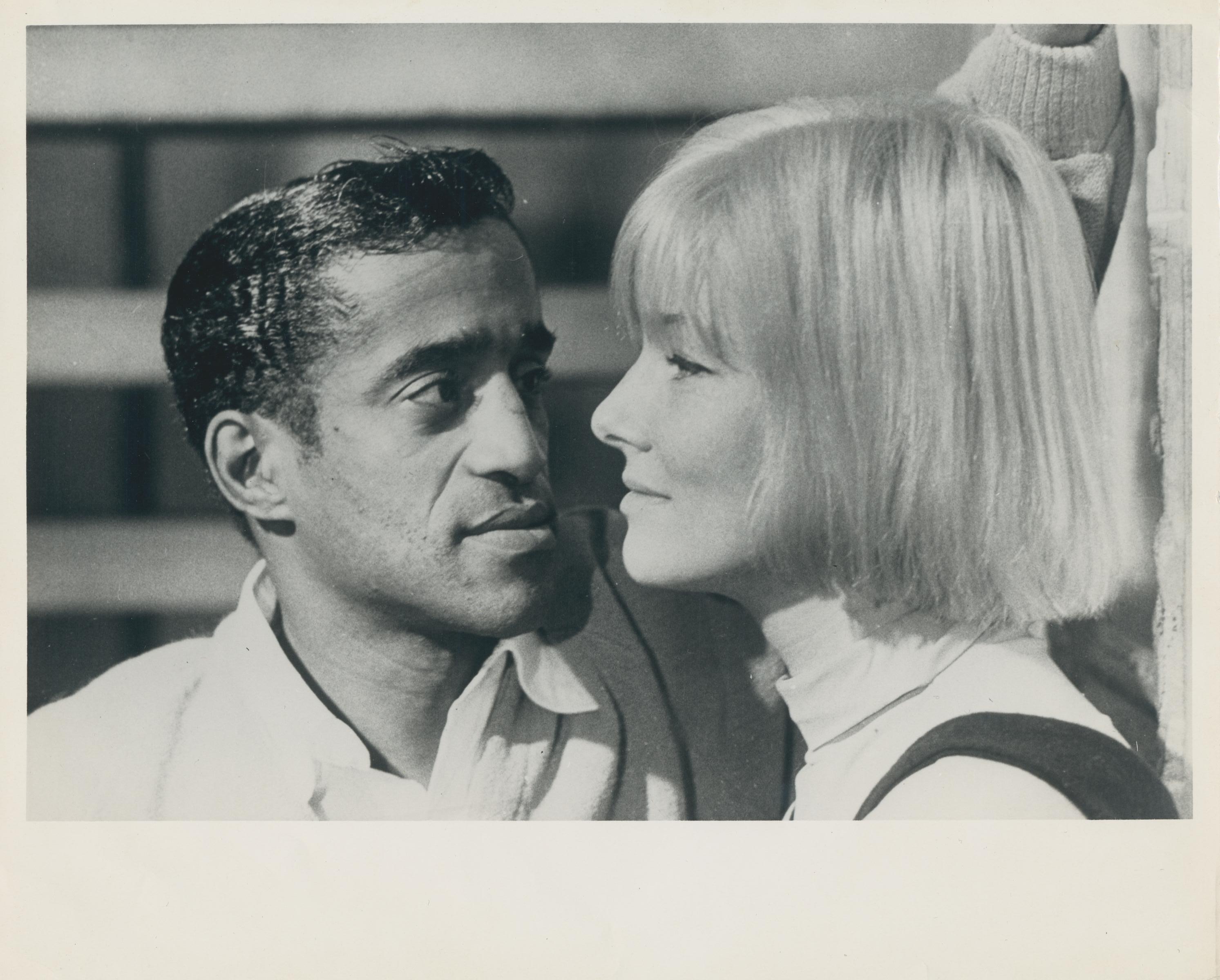 Henry Grossman Black and White Photograph - Sammy Davis Jr. and May Britt, unknown date