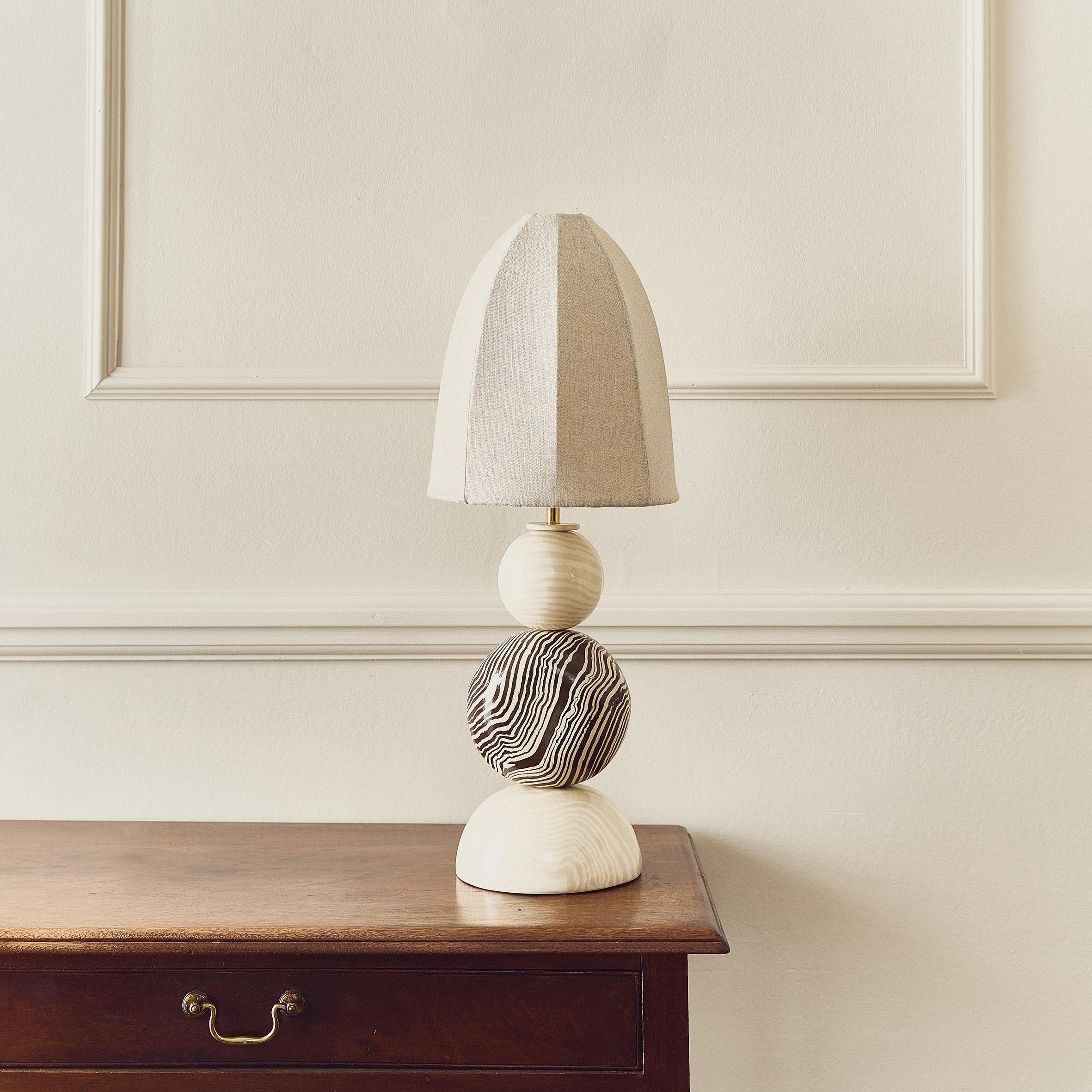 The Edison table lamp is elegant and refined, he takes up little real estate on your table, sideboard, or desk but he still proudly, lights up any space just like his namesake...

All styles are handmade in our London studio. The nature of our