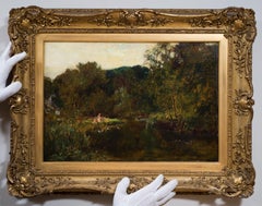 Bambini che danno da mangiare alle anatre, Bibury, Gloucestershire, Cotswold.