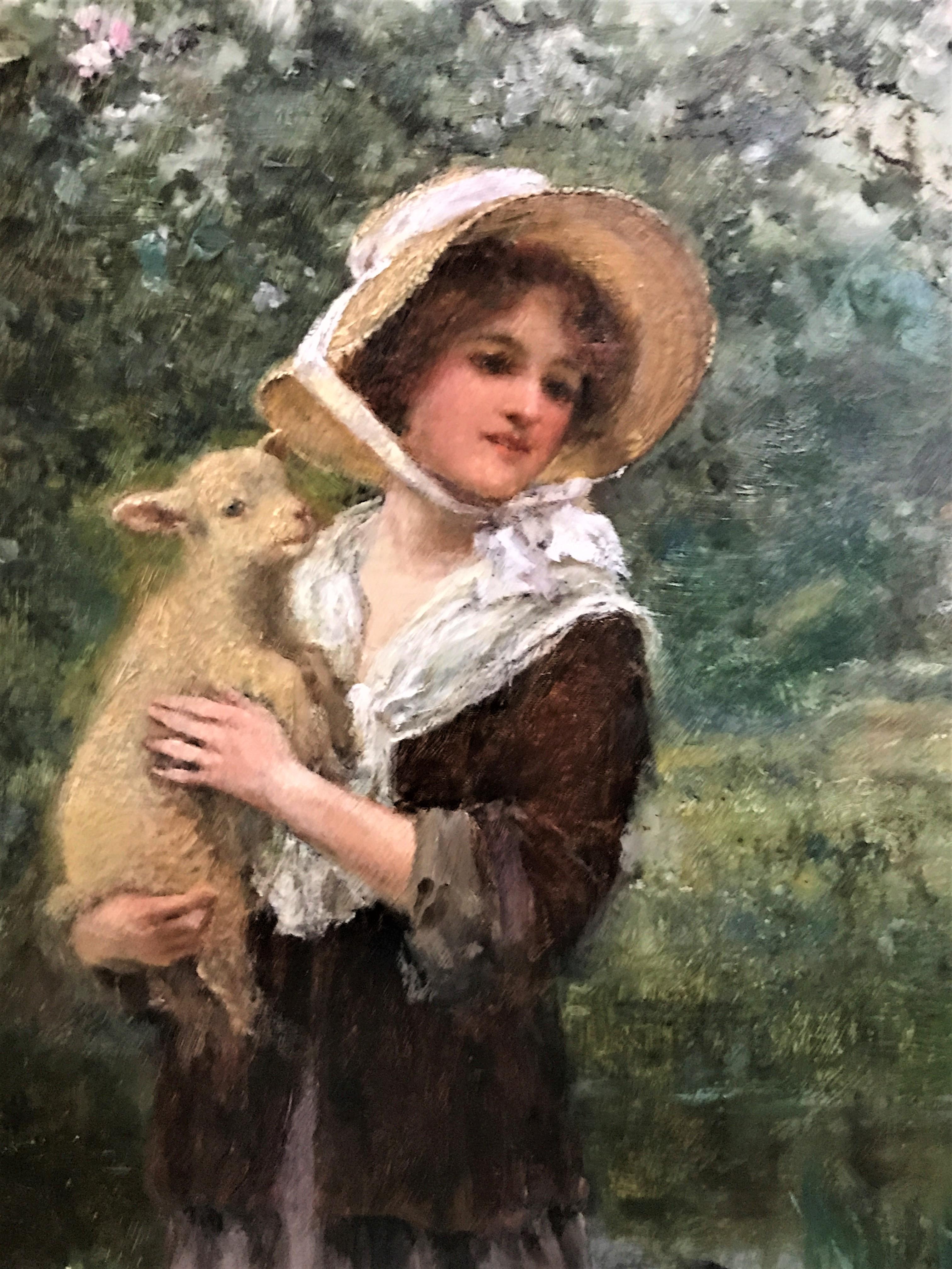woman holding a lamb painting