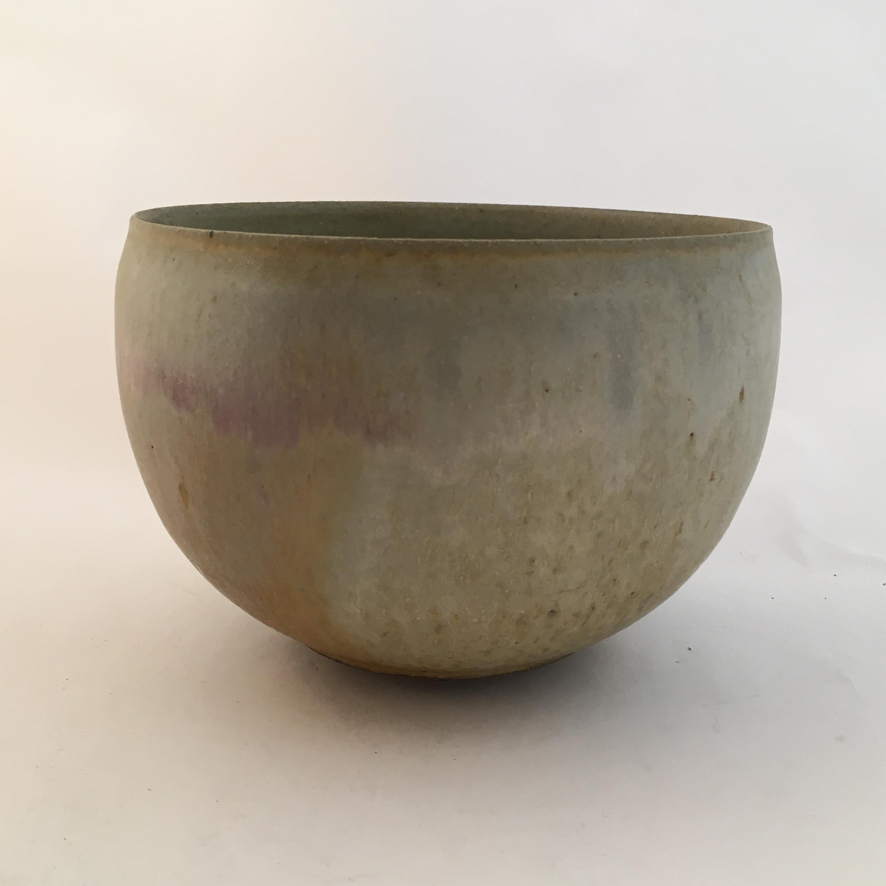 Beautiful Henry Kendall Gernhardt stoneware Studio Pottery bowl, circa 1970. Signed with impressed signature. Excellent condition; no chips, cracks, crazing, hairlines or restorations. Exquisitely glazed with a hint of shimmering pink among the