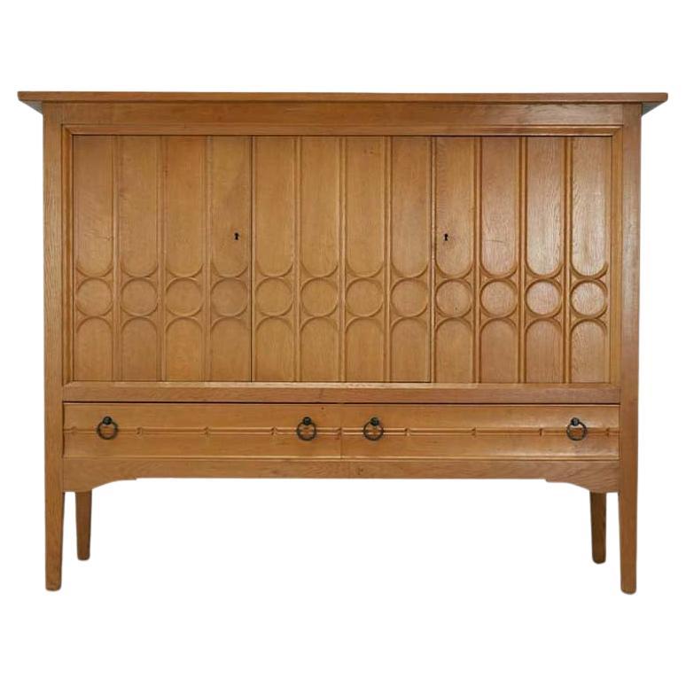 Tall Oak Sideboard in the Manner of Henry Kjaernulf For Sale at 1stDibs