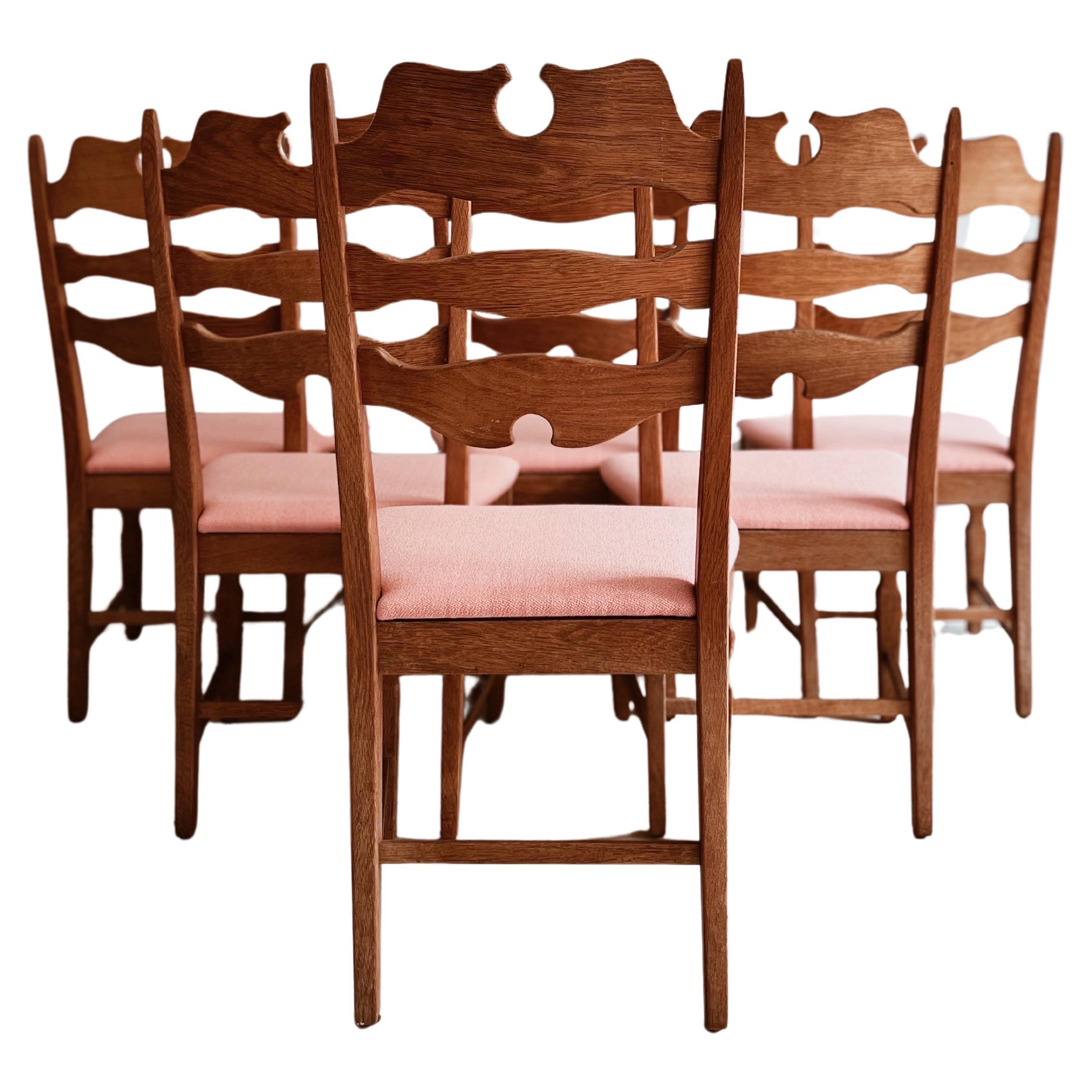 Scandinavian Modern Henning Kjærnulf razorblade dining chairs in oak and reupholstered seats