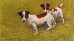 Piccolo olio di madre e figlio, Jack Russell Terrier, su una rigogliosa erba verde