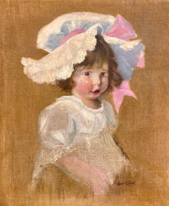Ritratto di studio di una bambina con un grande biglietto rosa