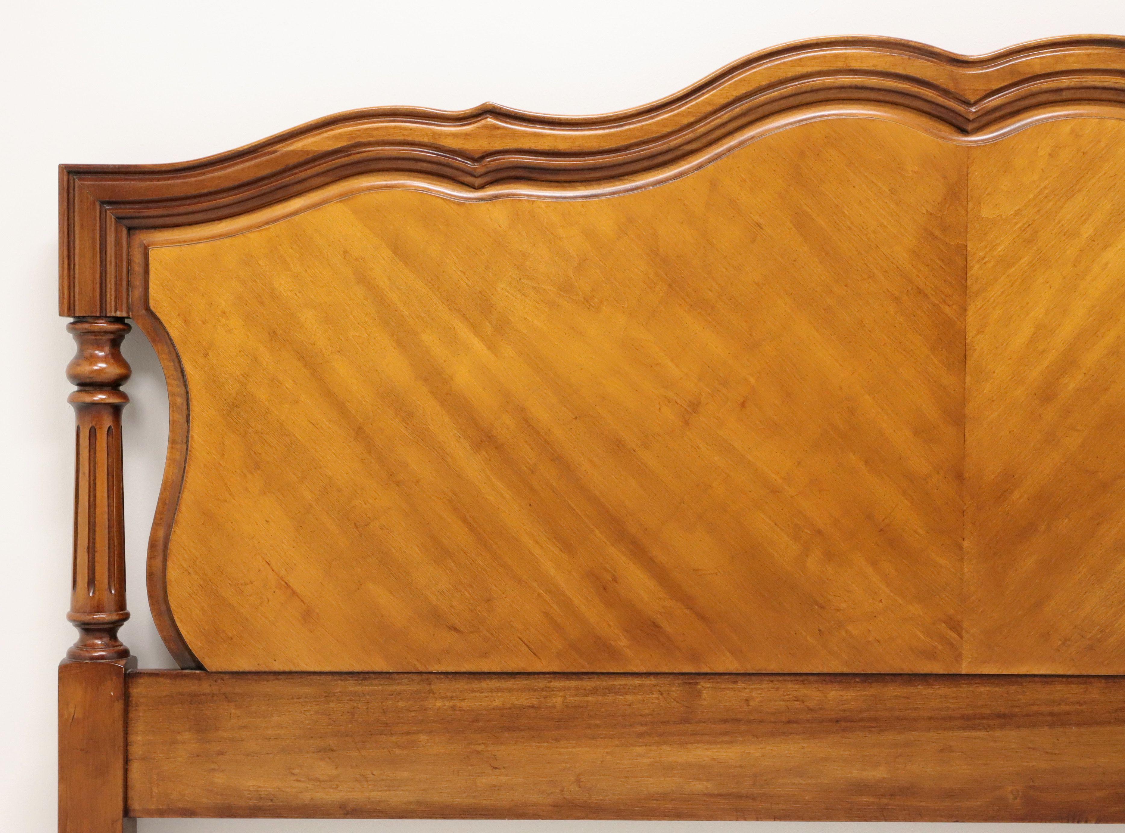 A French Country Louis XV style queen size headboard by Henry Link, part of Lexington Furniture, from their Margaux Collection. Cherry wood with inlays, scalloped arched top and column like sides. Made in Lexington, North Carolina, USA, in the late