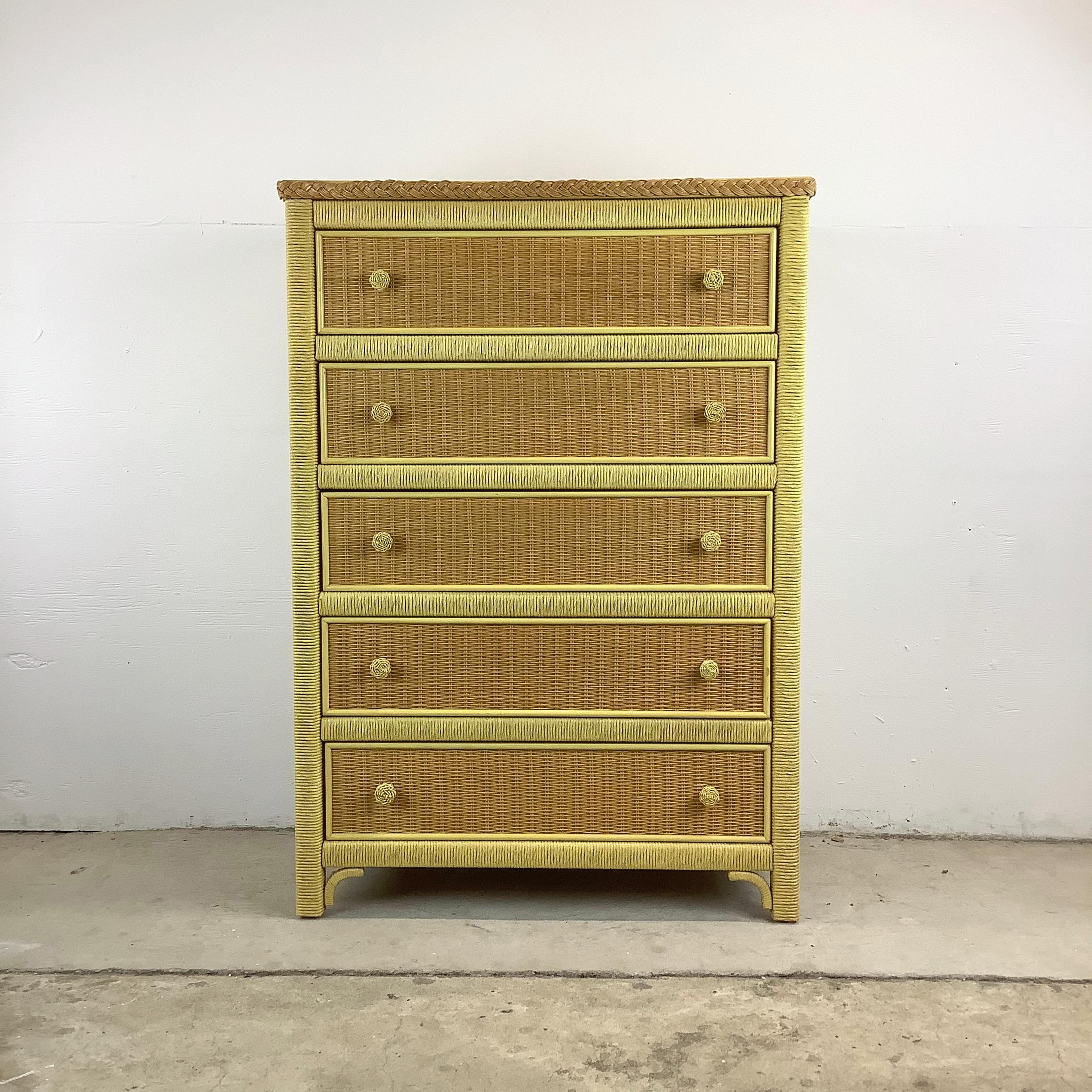 Introducing a captivating piece of vintage craftsmanship from the esteemed Henry Link Wicker line: this five-drawer highboy dresser combines practicality with timeless style. This exquisite dresser, featuring a natural woven design, captures the
