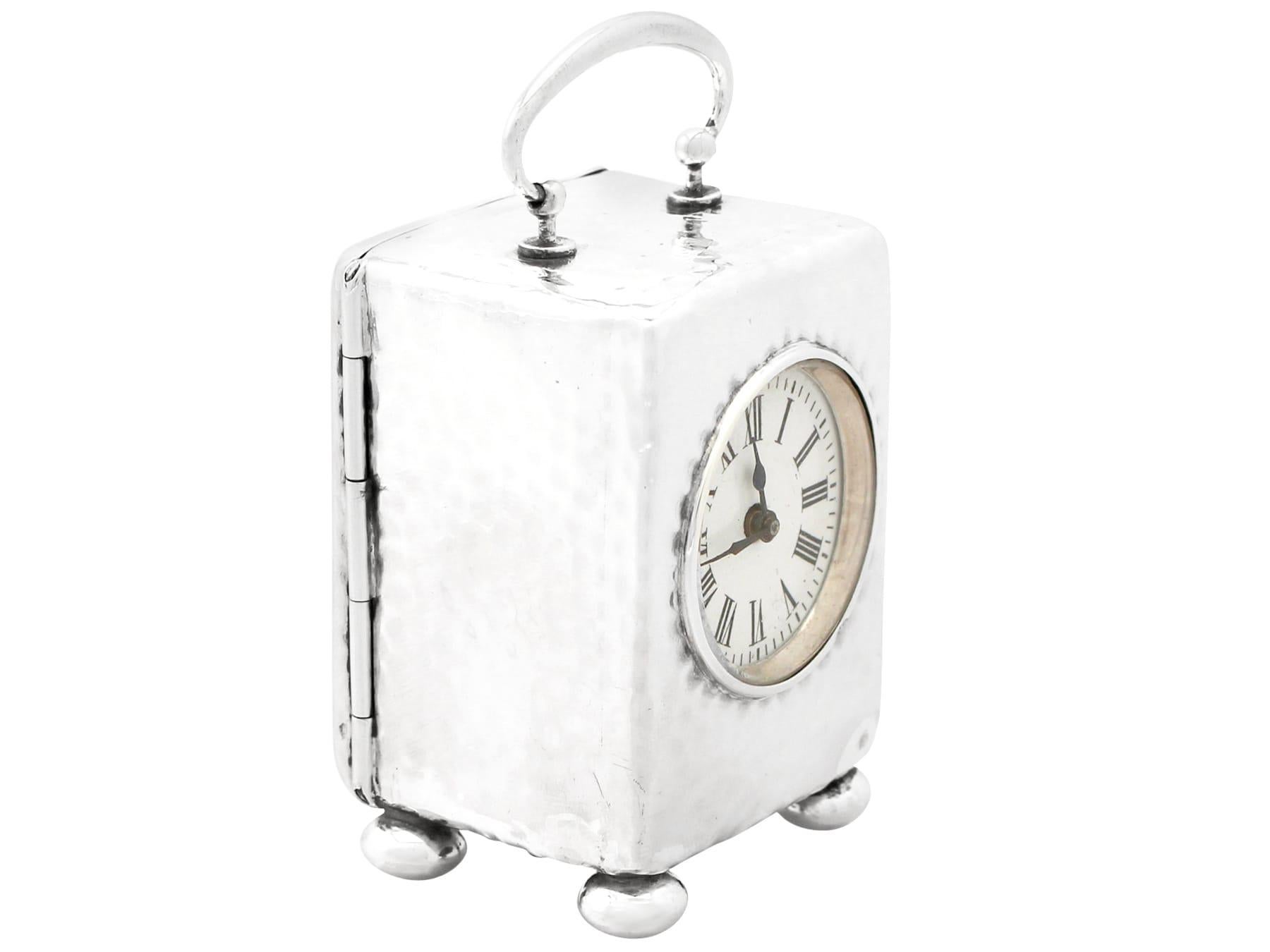 A fine and impressive antique Victorian English sterling silver eight-day boudoir clock; an addition to our silver timepiece collection.

This fine antique Victorian sterling silver boudoir clock has a plain rectangular form onto four bun