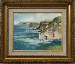 Vintage Ireland Landscape Rocky Cliffs with Castle on the Northern Irish Sea Coastline