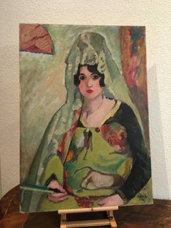 Giovane spagnola con mantiglia e ventaglio