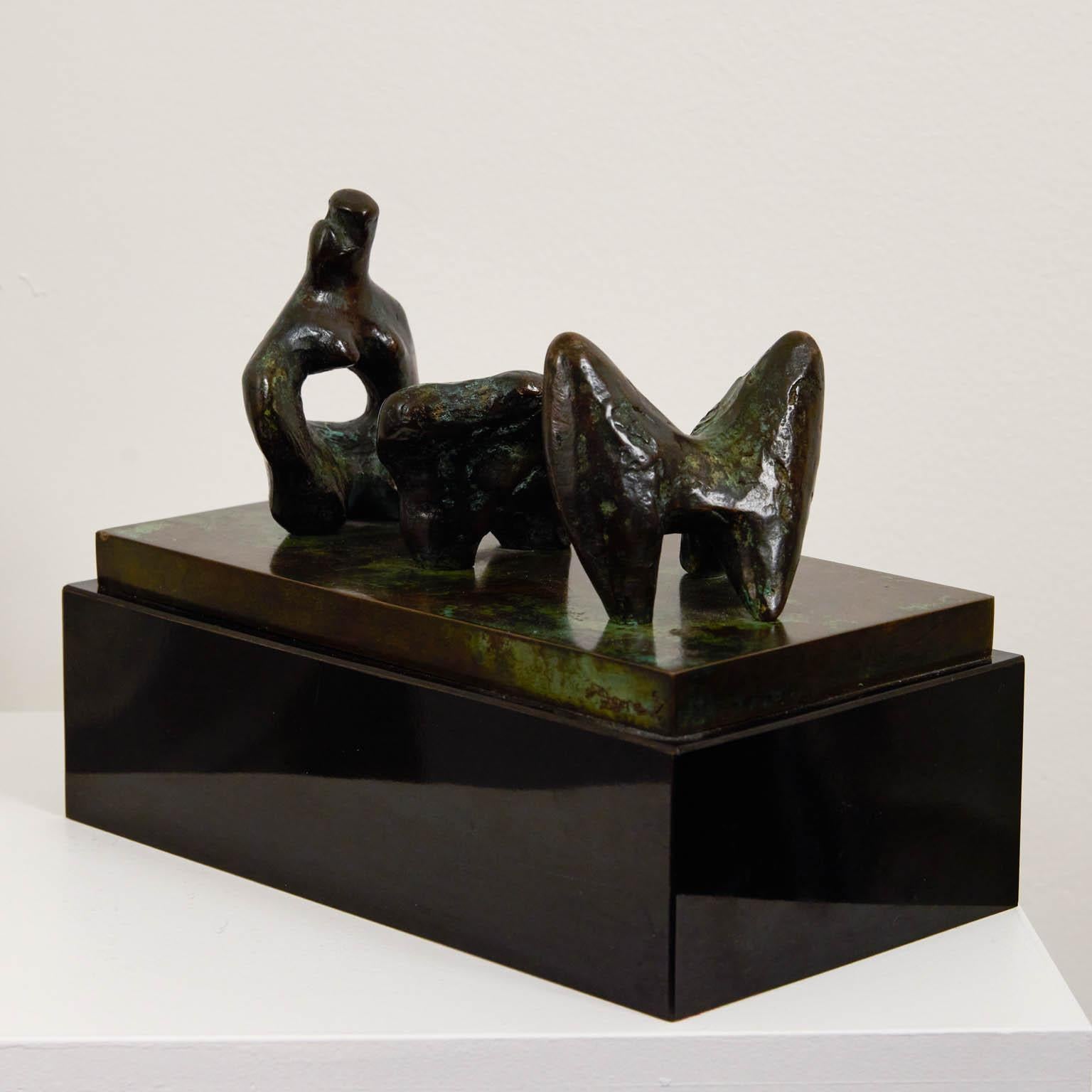 Three Piece Reclining Figure - Gold Abstract Sculpture by Henry Moore