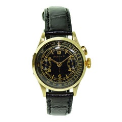 Henry Moser 14 Karat Gold Chronograph with a Rare Original Black Dial