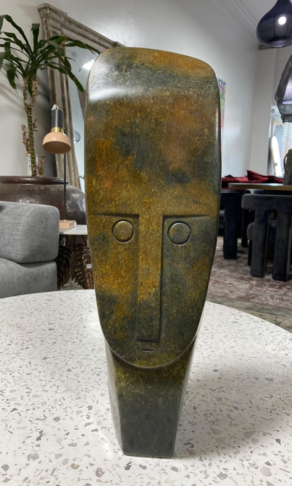 A beautiful, wonderfully executed sculpture by renowned African sculptor/artist Henry Munyaradzi (1931-1998). He was also known as Henry Mudzengerere/Mzengerere) who lived and worked in Zimbabwe. 

This piece is carved from serpentine stone which