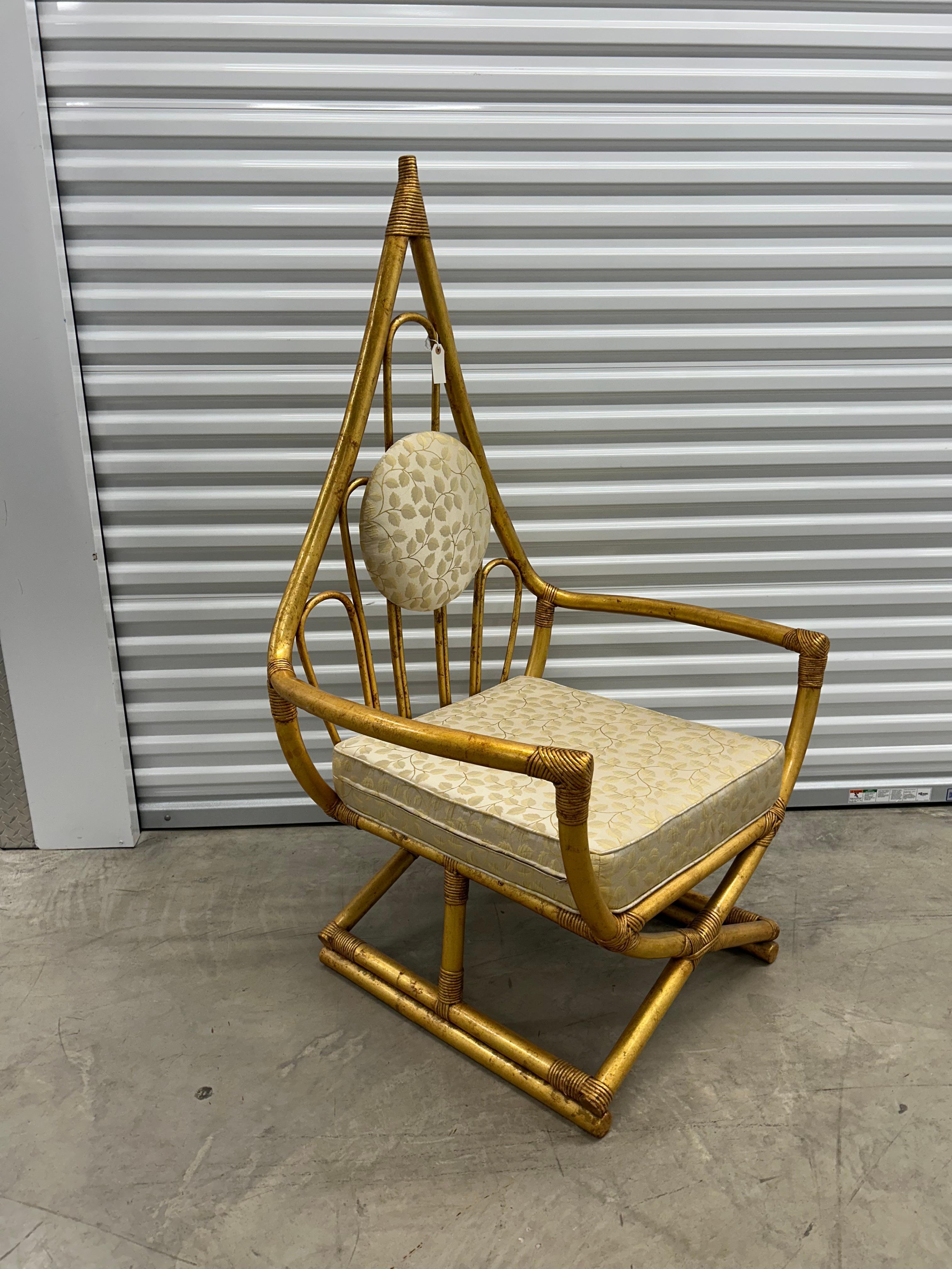 Designed by Henry Olko for Willow and Reed .A high back peacock throne chair finished in a Gold tone.. in very good condition… Original cushions in good shape no damage damages to the structure very sound and stable. Well built.. sturdy and