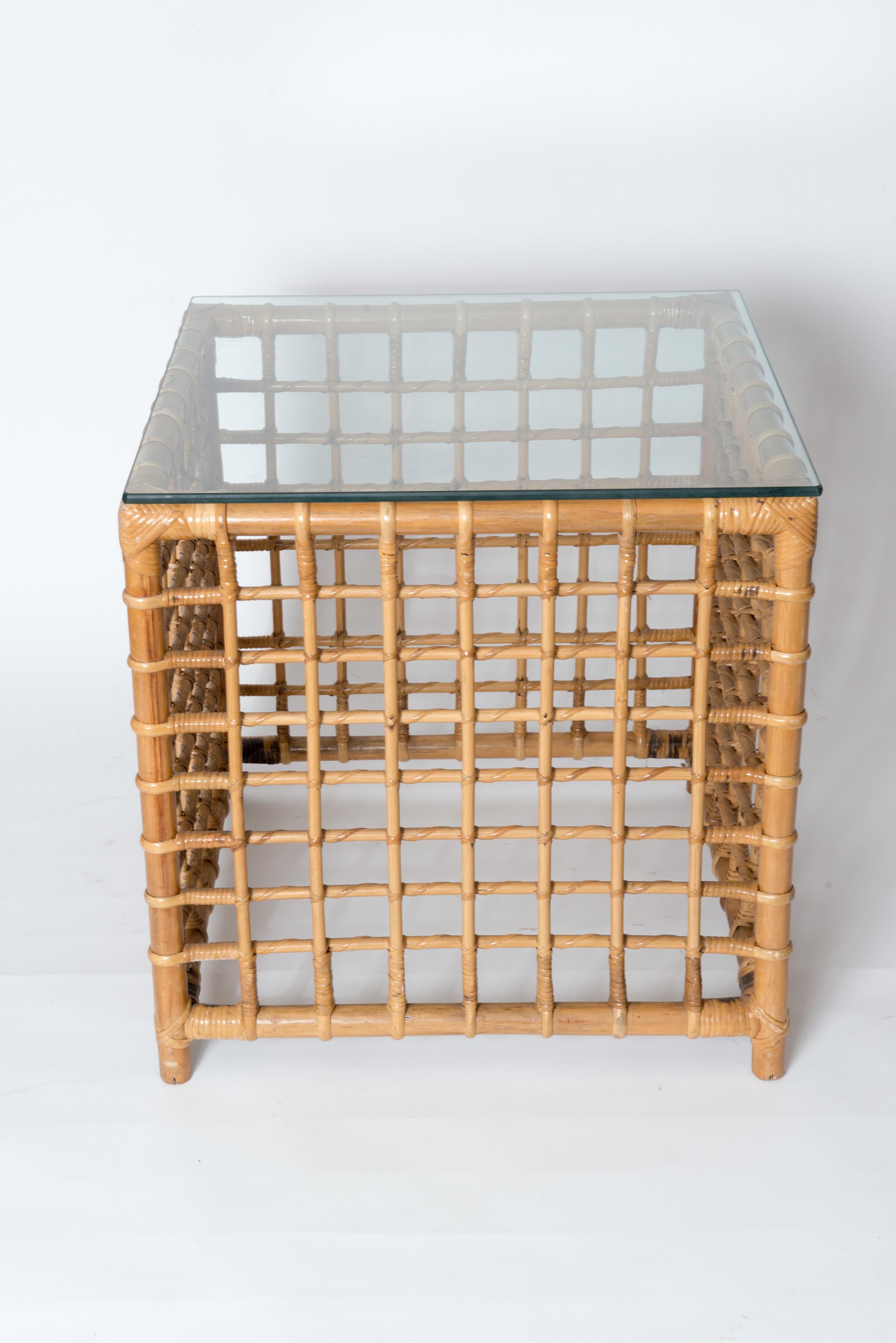 An exquisite and rare rattan cube table by accomplished Henry Olko for his 
Willow and Reed Company, circa 1975. This unique table is from Olko's Square Series. Henry Olko had a Master's degree from M.I.T.
This piece is substantial, sturdy rattan