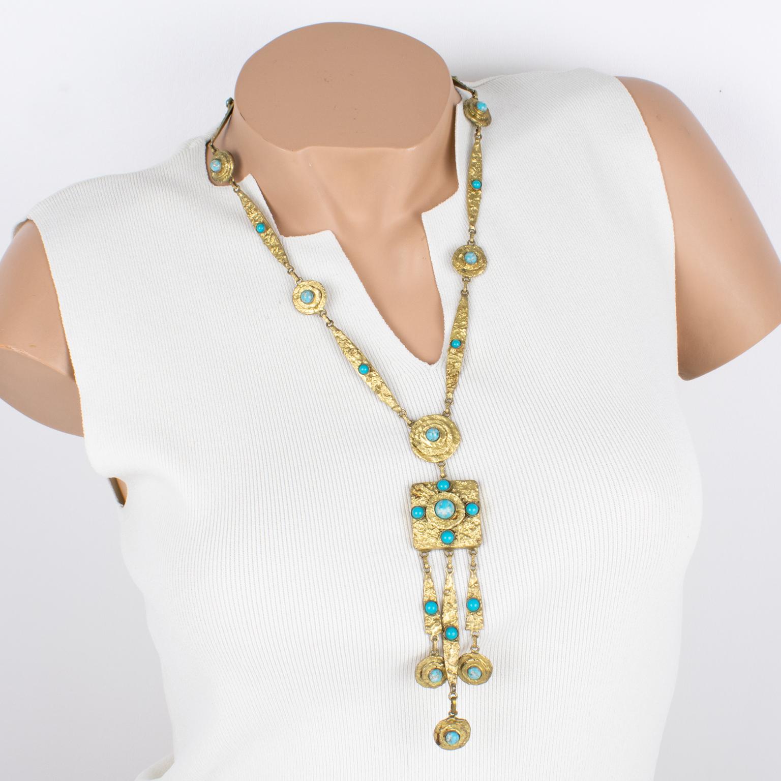 Henry Perichon (aka Henry) designed this stunning Medieval revival gilded bronze pendant necklace. With its antique Middle-Age design influences, this long bronze choker is ornate with turquoise-like poured glass cabochons. 