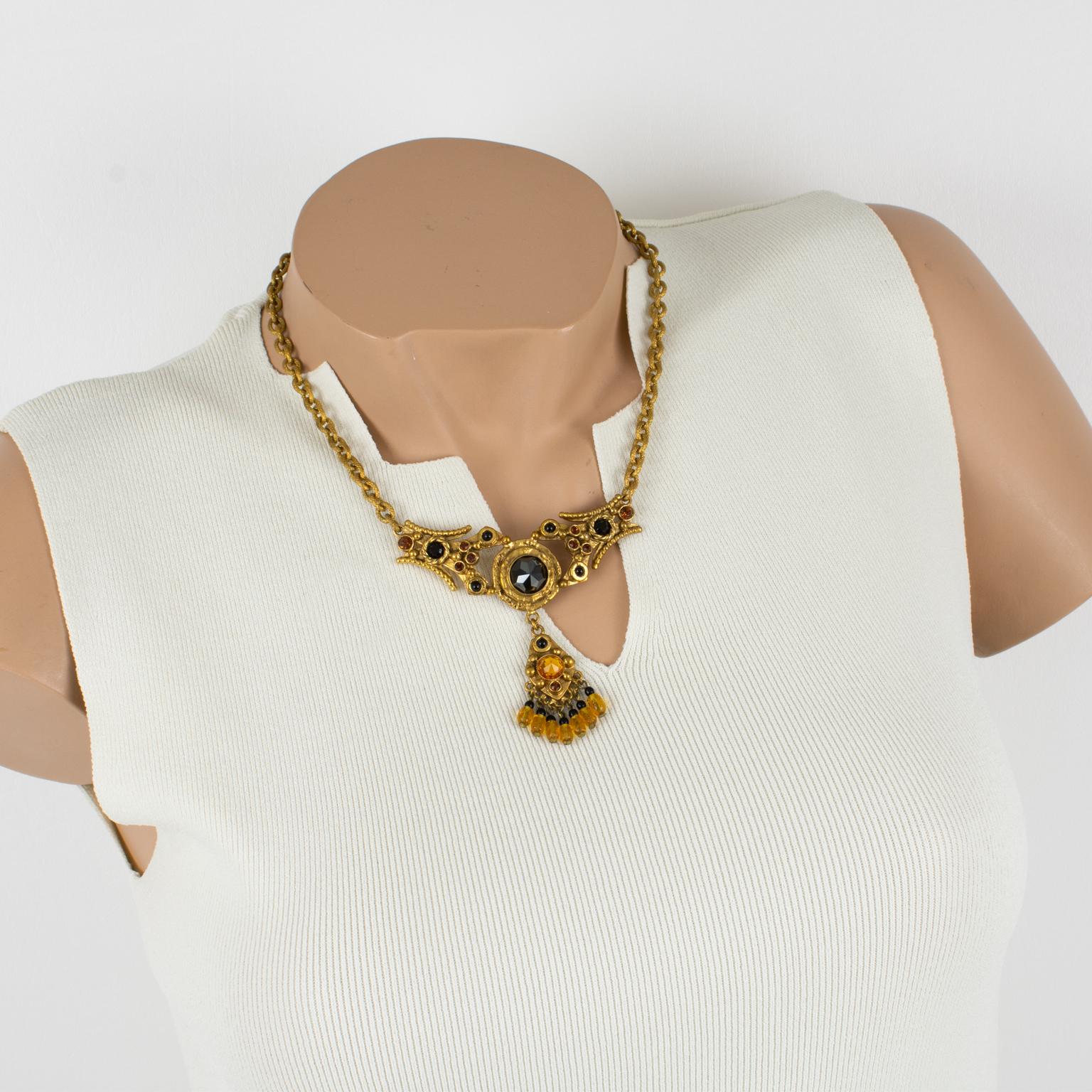This is a stunning Henry Perichon (aka Henry), Medieval revival gilded bronze pendant necklace. The bronze metal pendant with antique Middle-Age design influences is ornated with faceted French black jet glass cabochons, orange topaz, and yellow