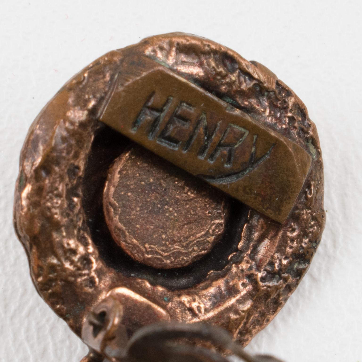 Henry Perichon Ohrringe aus Kupfer, Metall und roten Steinen Damen