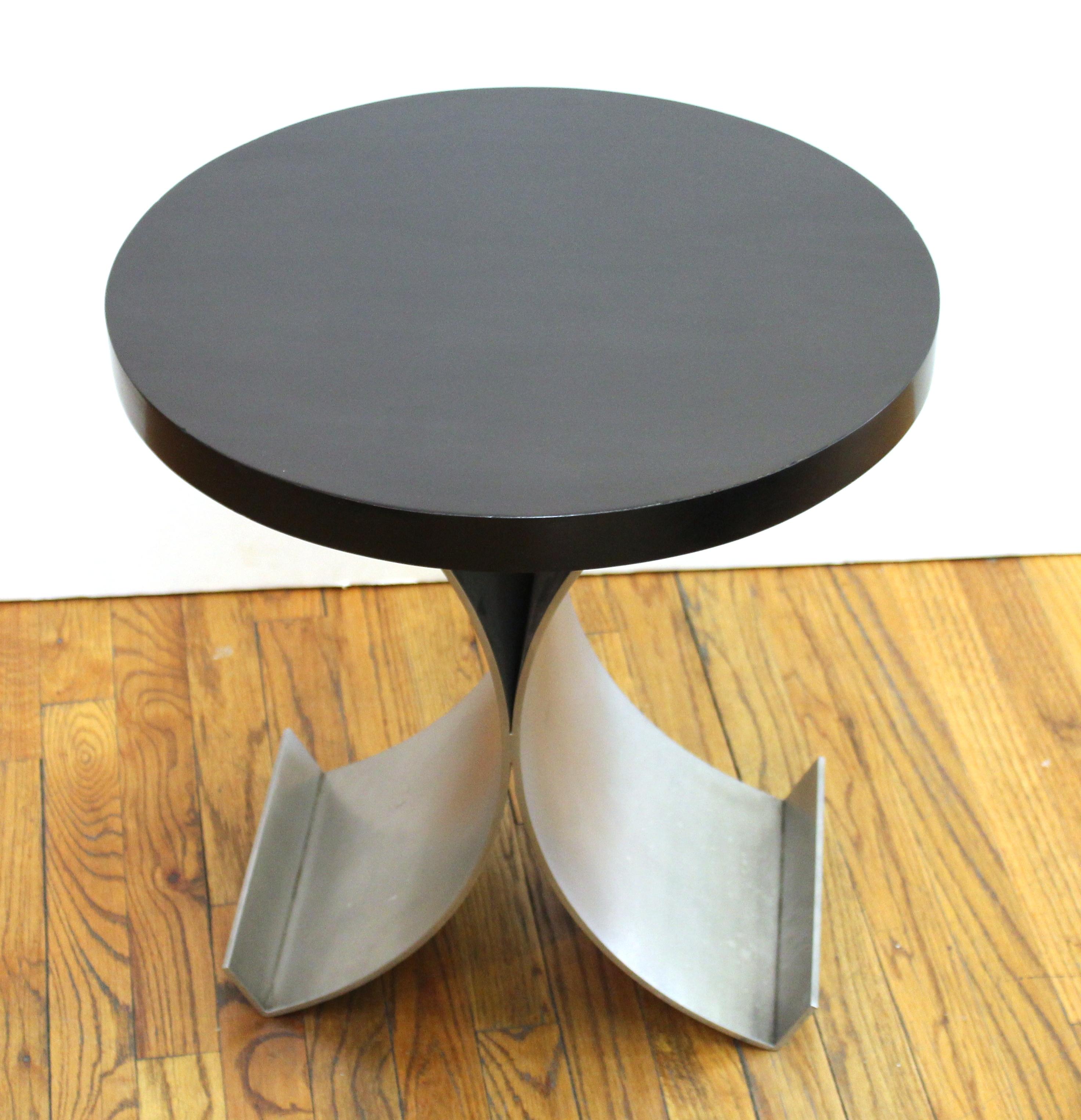 Henry Royer modern side table with round wood top and arched metal base, handcrafted and marked 'Henry Royer' on the bottom.
