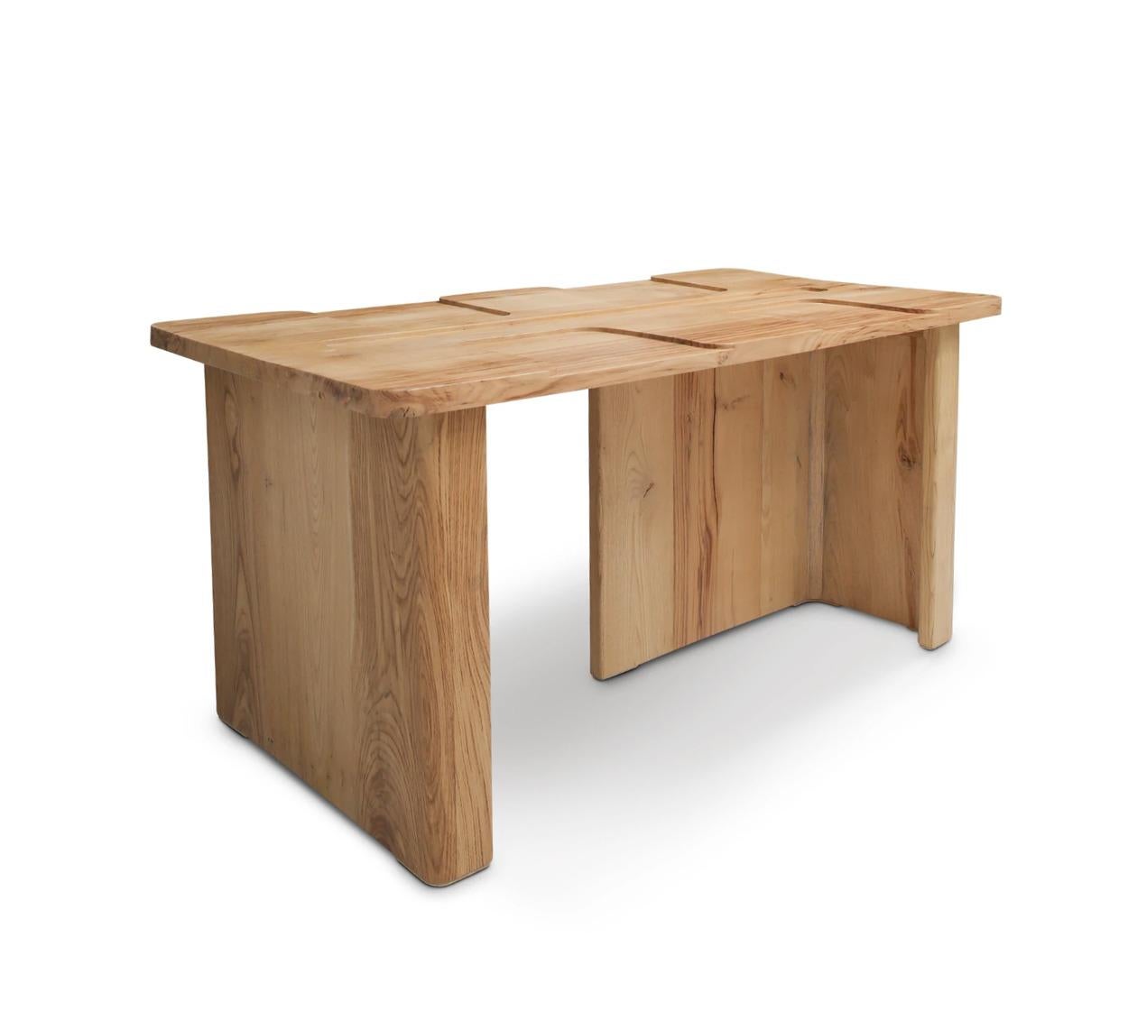 Henry Table by ZAROLAT 
Dimensions: D 85 x W 150 x H 70 cm. 
Materials: Chestnut wood.

The Henry Table is a manifestation to go beyond a traditional dining table. It proposes a deep sensitivity to give direction to dish placement and seating for