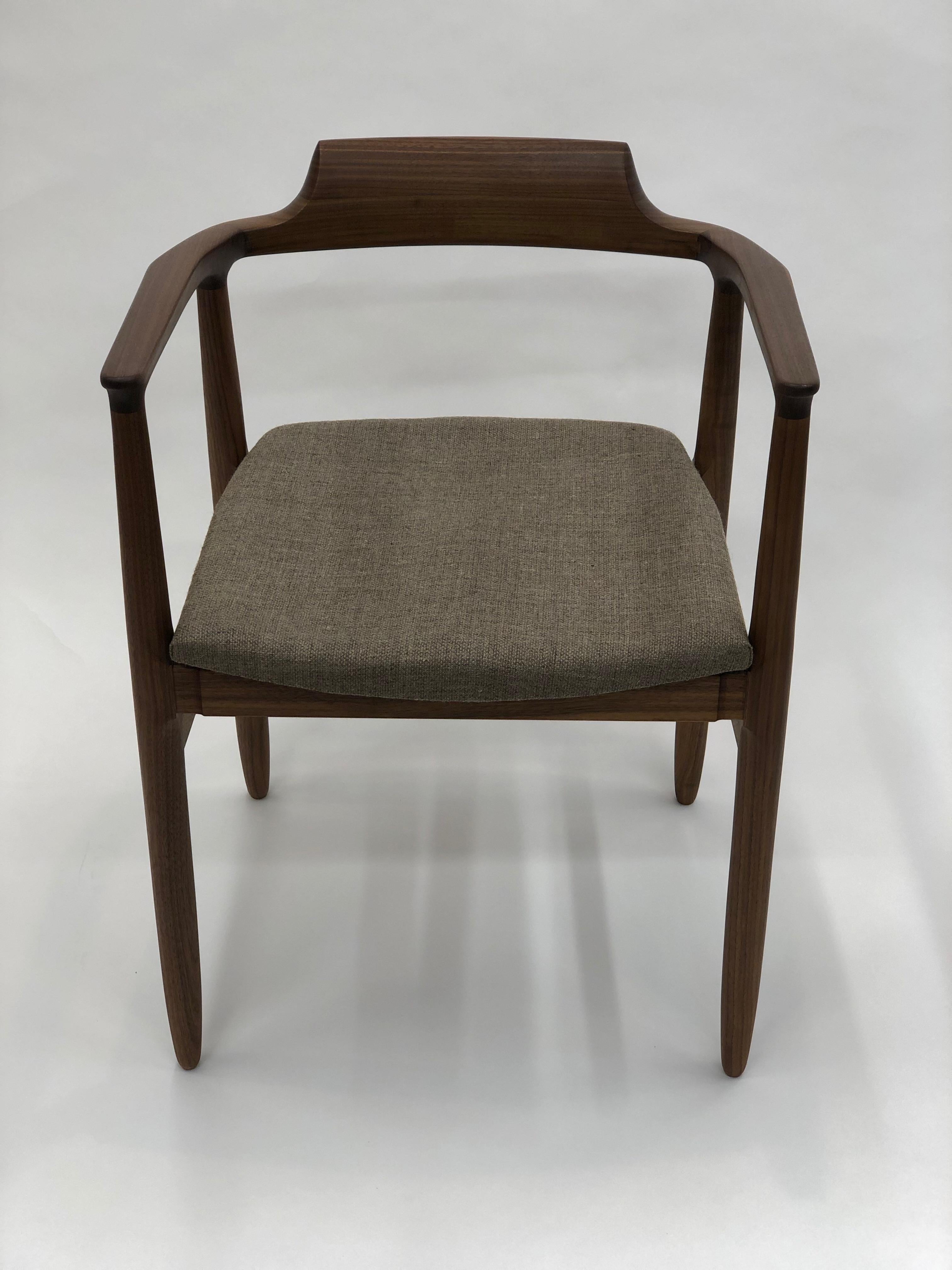Henry the armchair is an original design by Brian Holcombe. Ergonomically designed around the human proportion this chair accommodates comfortable seating.

These chairs are individually handmade and can be purchased in a variety of materials by