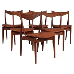 A. Klein Six chaises de salle à manger, teck et cuir pleine fleur