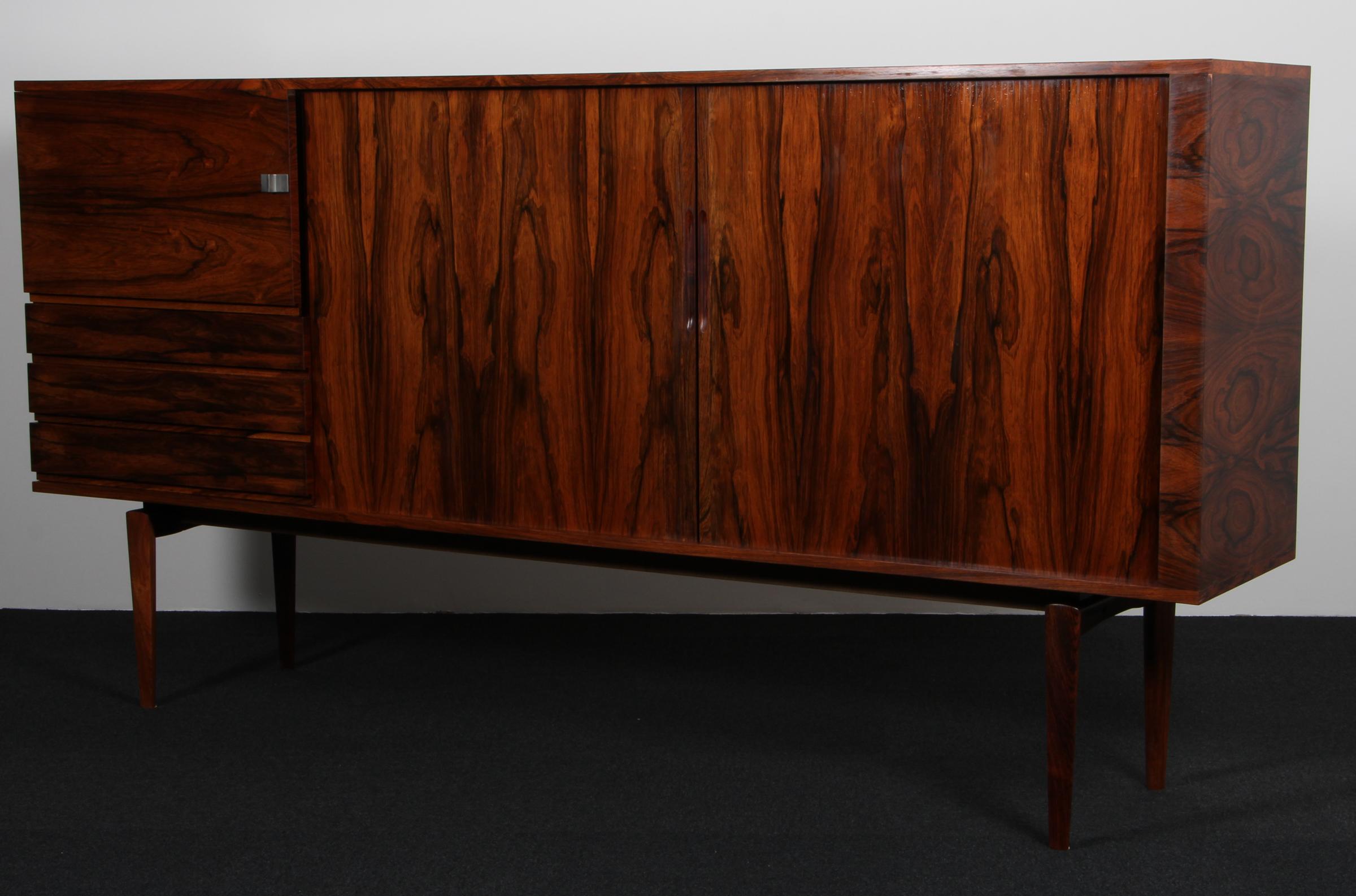 Henry Walter Klein sideboard in teak. Sliding doors, drawers and doors.

Made in the 1960s