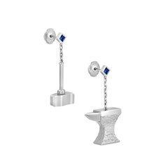 Hephaestus’ Hammer and Anvil Earrings, 18-carat white gold, sapphires, diamonds