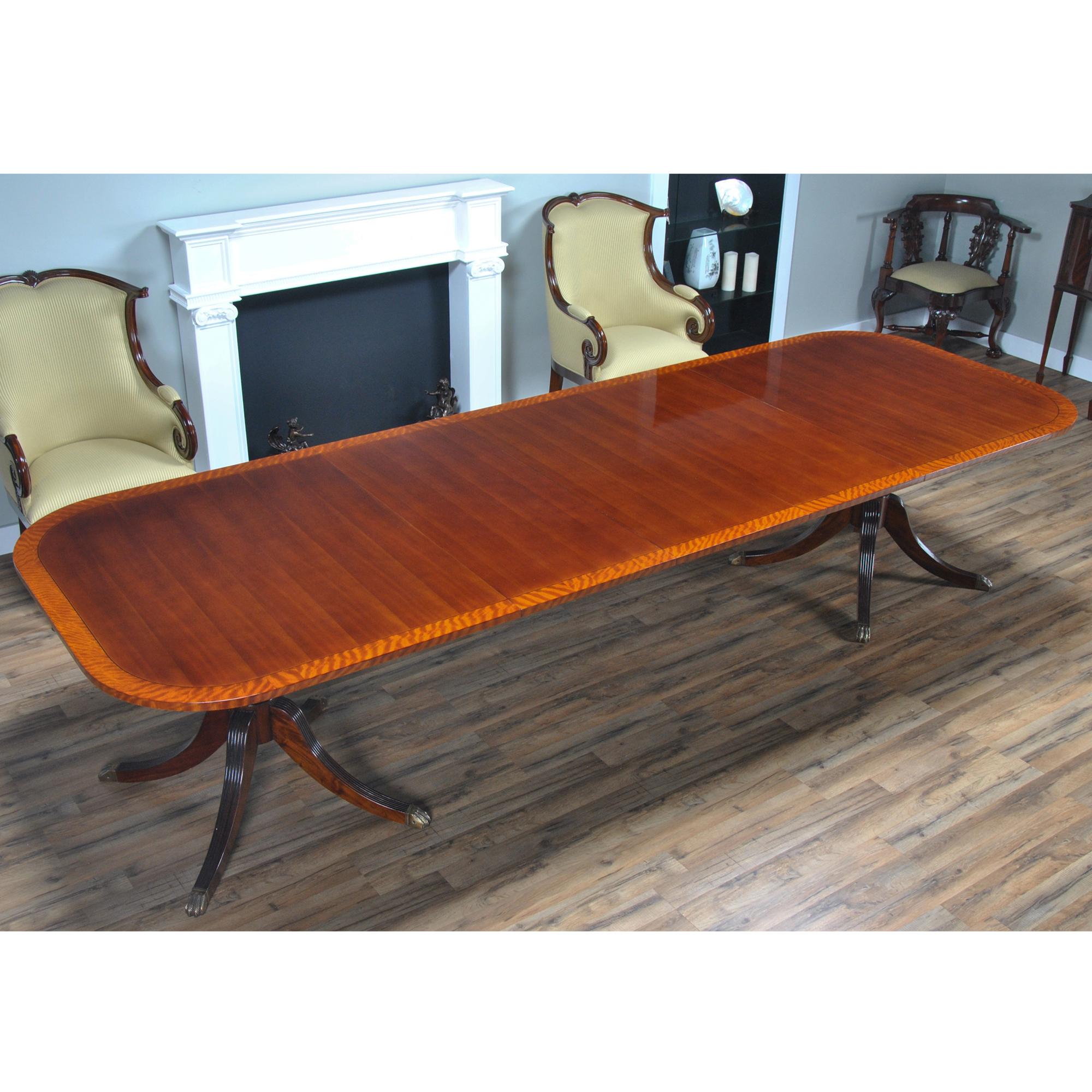 This version of a Hepplewhite Dining Table is Inspired by great furniture designers such as George Hepplewhite in the 18th century this long dining table is both simple and elegant.  In order to give this table such a great look a straight grained