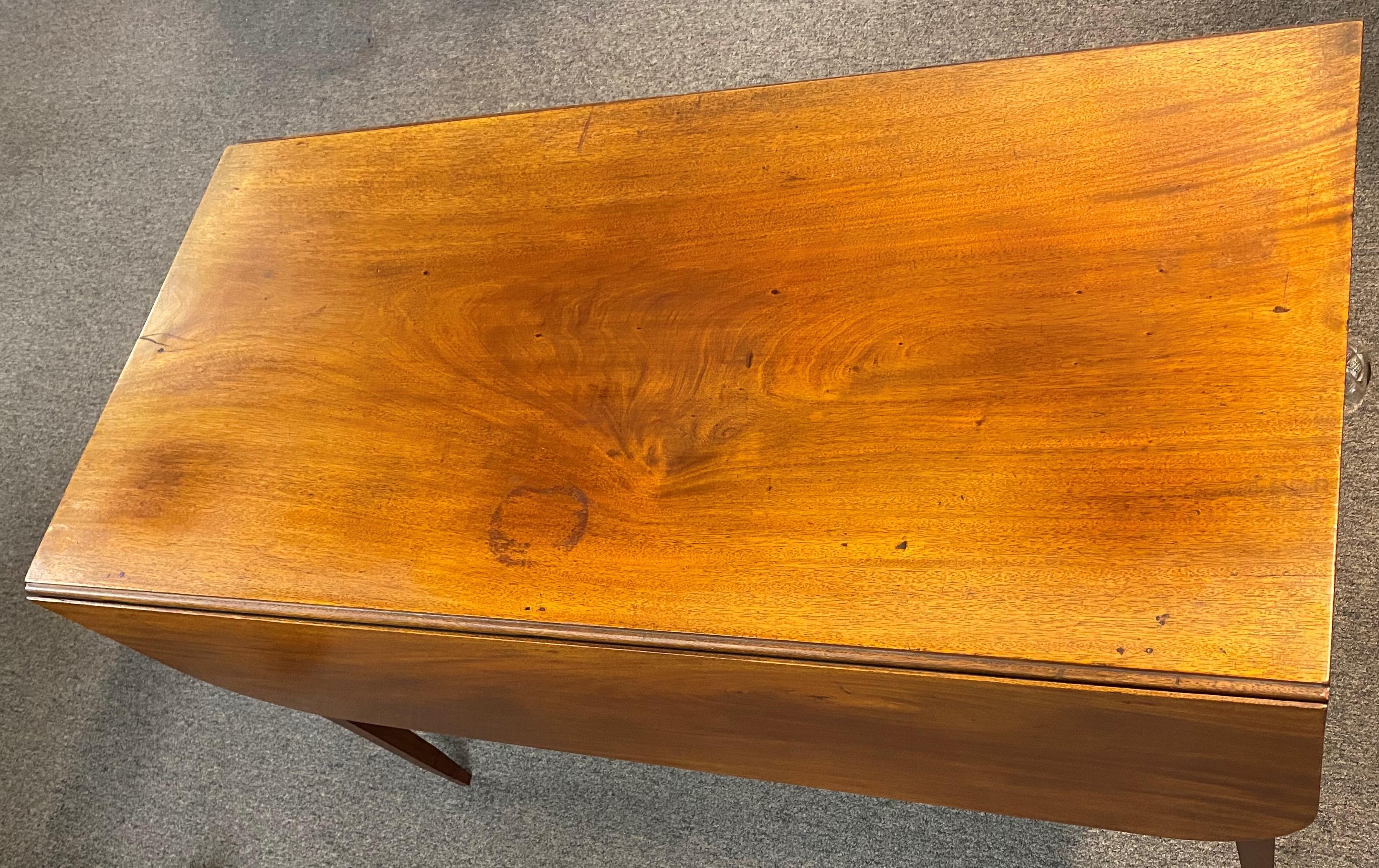 A fine Hepplewhite mahogany drop leaf table with a cockbeaded single drawer on each end, with glass pulls, rounded corners, and tapered square legs. Inside one of the drawers is a single sheet provenance back to Timothy Pickering, (born