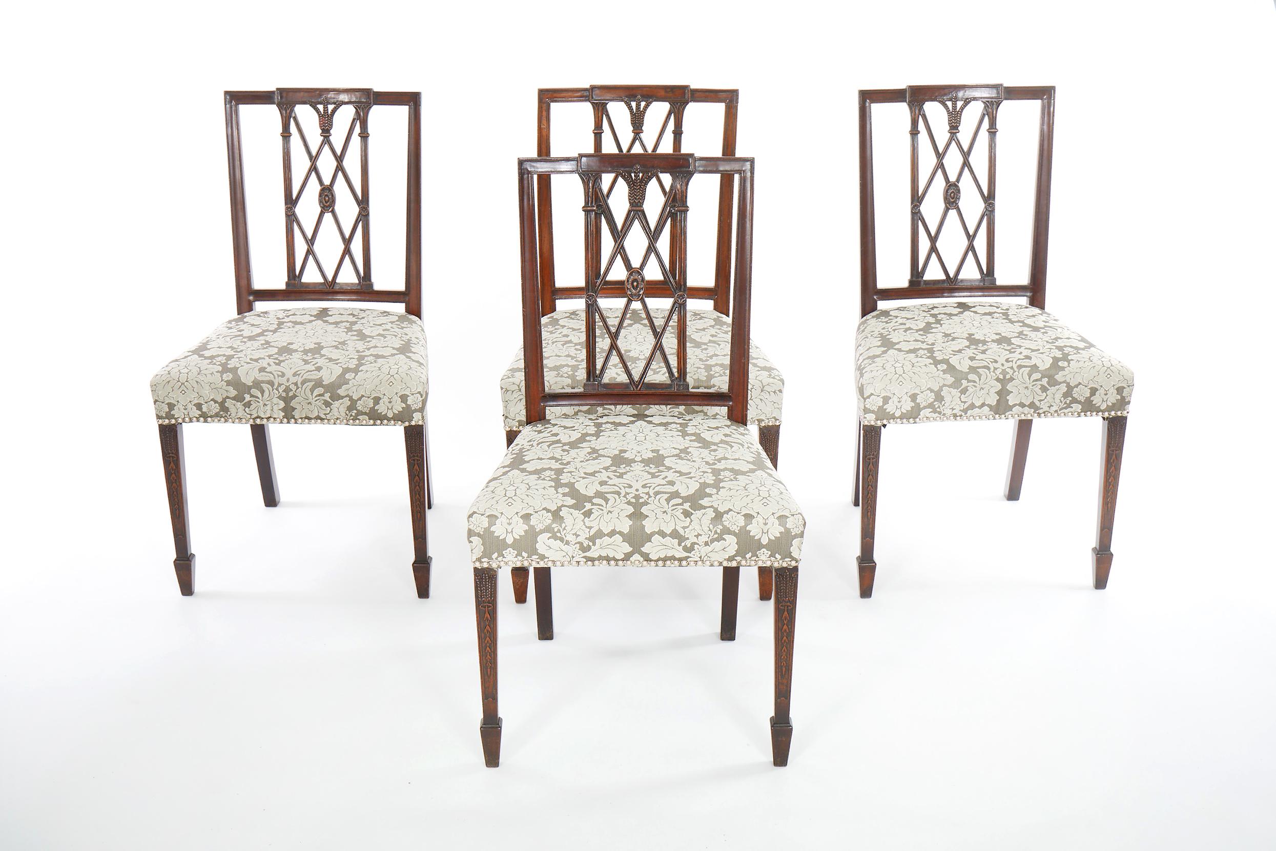 Beautifully hand craved mahogany wood Hepplewhite style dinning chairs. The set include 6 dining room chairs. Each chair is in good antique condition. Minor wear consistent with age / use. The upholstery is very immaculate. Each chair measures about