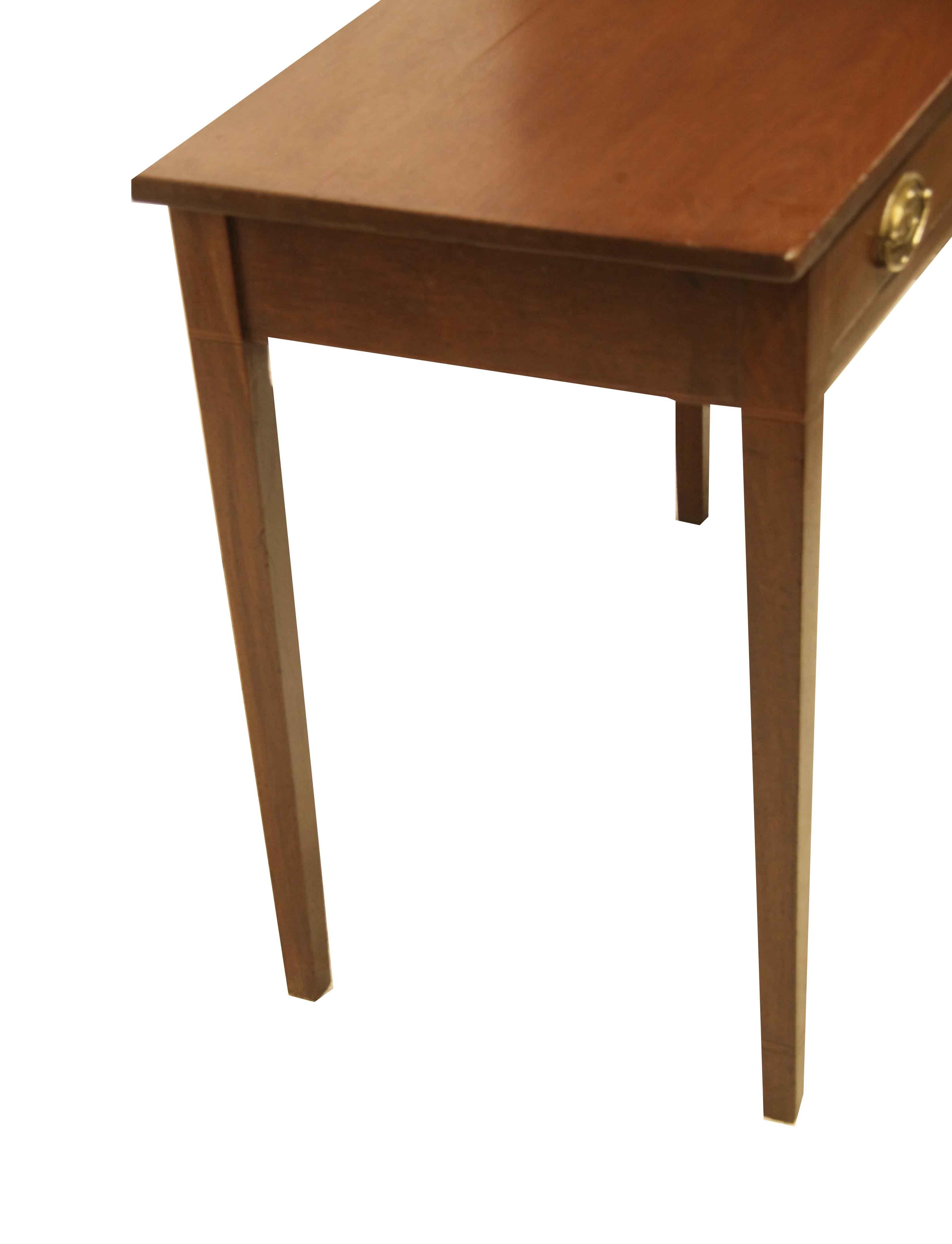 Hepplewhite inlaid side table, with beautiful color and patina, the nautical theme oval brass pulls are hand made (not original). The drawer is inlaid with boxwood around the edge; there is a band of inlay below the drawer continuing around the