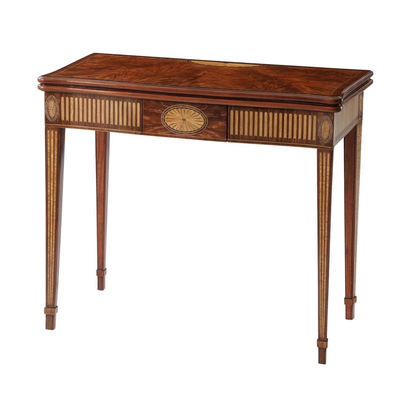 A fine George III Hepplewhite style flame mahogany and parquetry veneered accordion action games table, the serpentine molded edge top crossbanded in Morado and fine stringing, opening to reveal a leather inlaid and gilt-tooled playing surface,