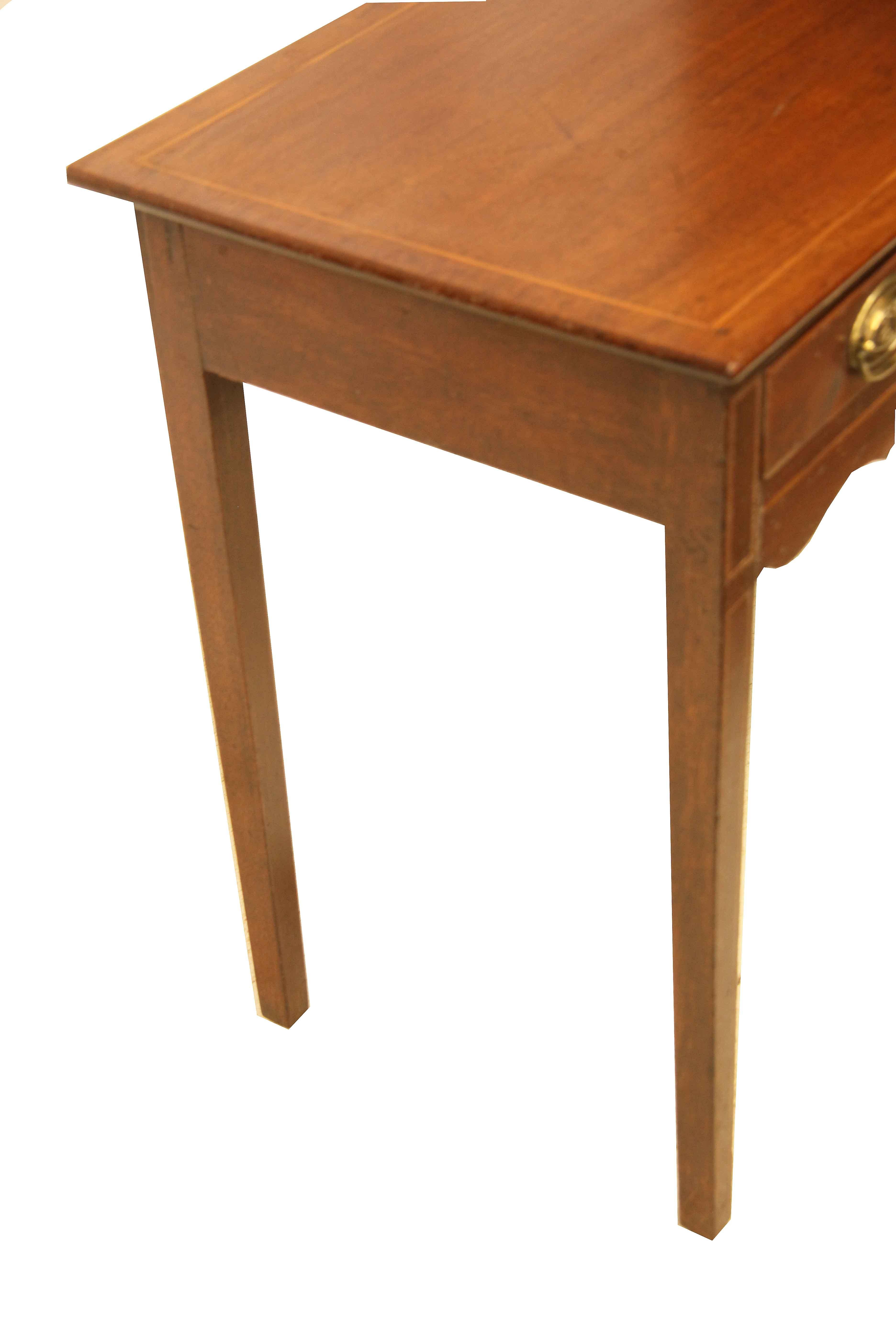 Hepplewhite one drawer table, the top has a beautiful color and patina with the perimeter inlaid with boxwood. The single drawer is also inlaid around the edge. The legs are nicely tapered with the front leg face inlaid with a herringbone pattern