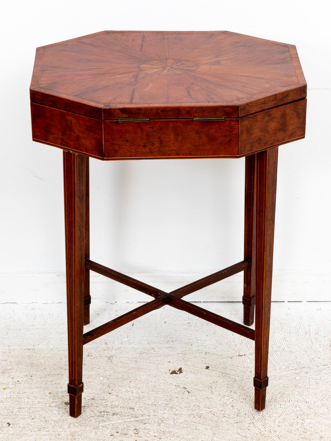 Circa 1790-1820s box top side table in Mahogany with Satinwood and Rosewood inlay in the style of Thomas Hepplewhite. The tabletop features a radiating inlay top with central medallion. The base is supported by an x-shaped cross stretcher and spade