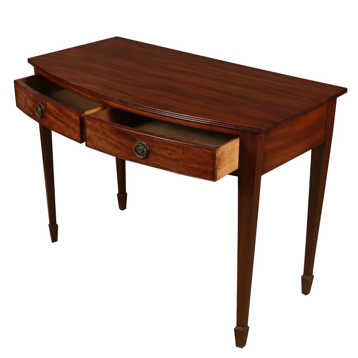 Hepplewhite style, mahogany antique server with two drawers, round hardware, curved front and tapered legs