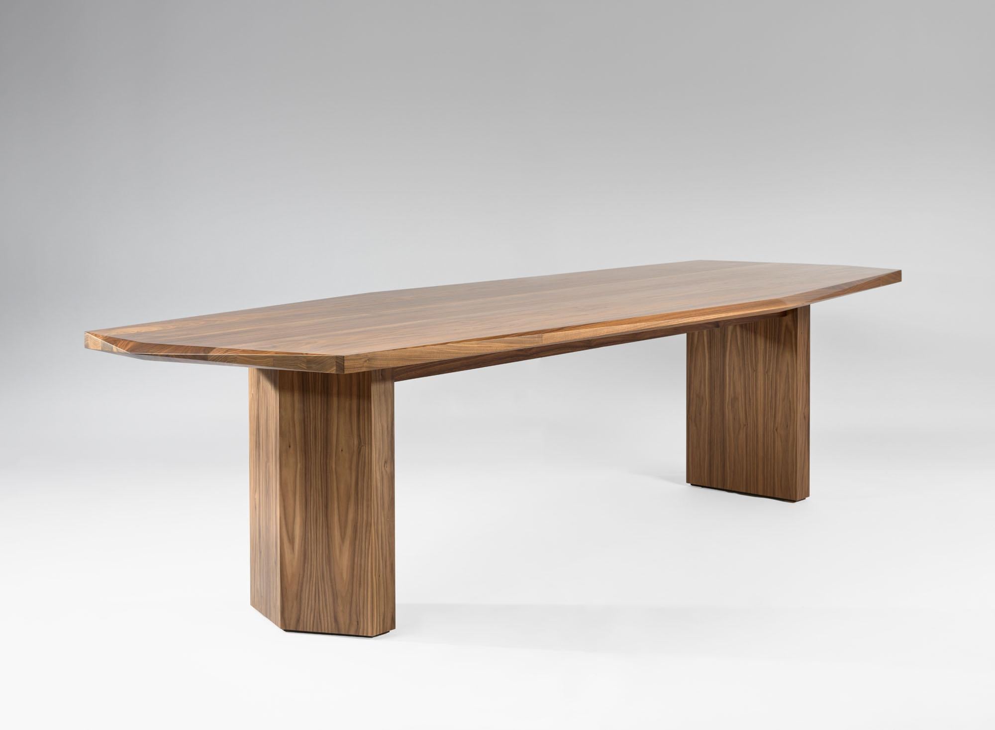 Hera table 300 by Tim Vranken
Materials: American walnut
Dimensions: L 300 x W 111 x H 75 cm

Also available in other types of wood. 

Hera, an interplay of lines and shapes, without the slightest frills. 

Tim Vranken is a Belgian furniture