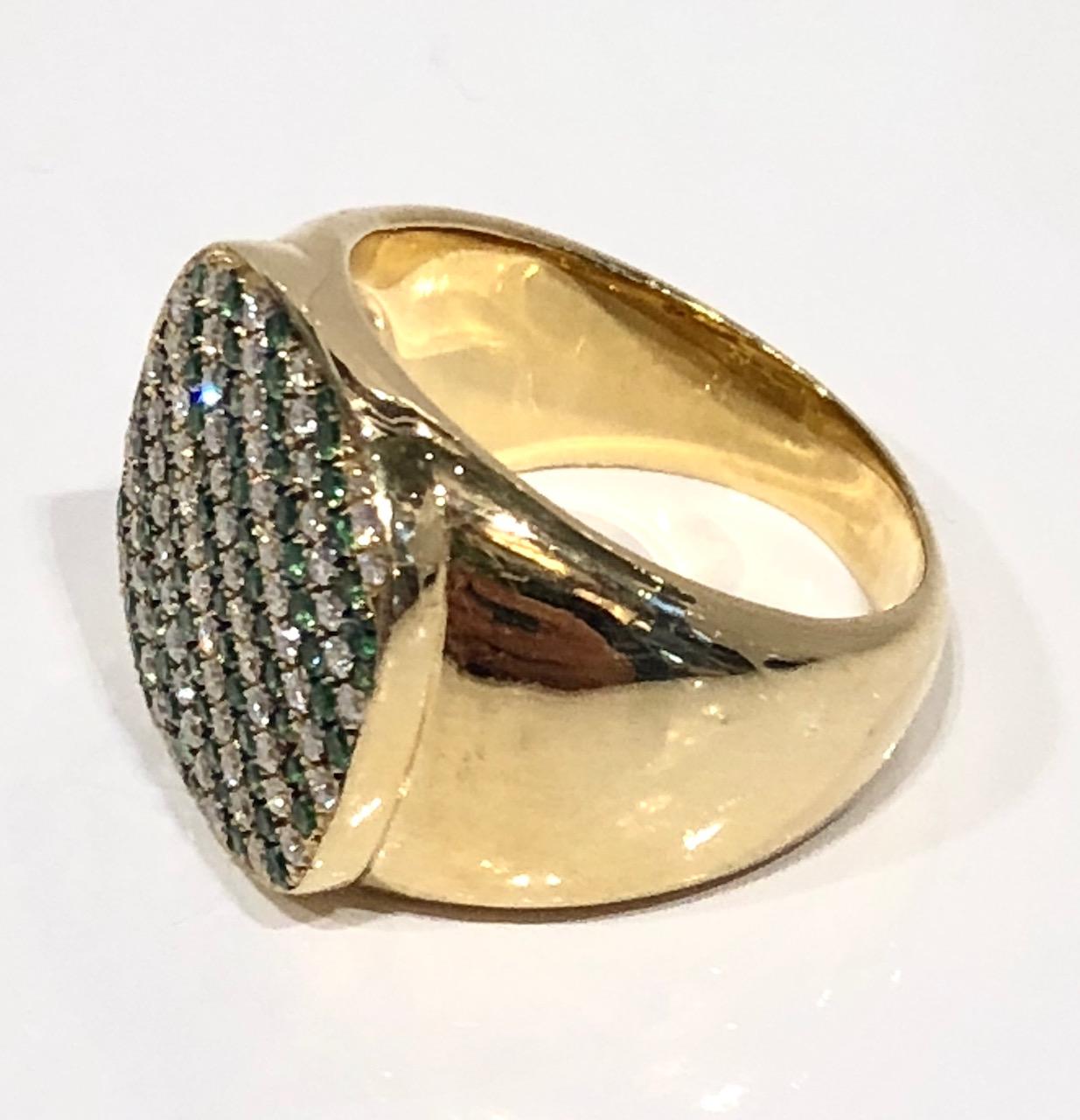 Unisex 18k yellow gold Signet ring with diamond and green tsavorite garnet pave face.
Designed by Martyn Lawrence Bullard
Can be made in any size, lead time 4 weeks
