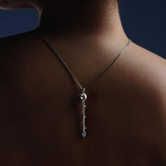 Hera’s Sceptre Pendant, 18-carat white gold, sapphires, emeralds and diamonds