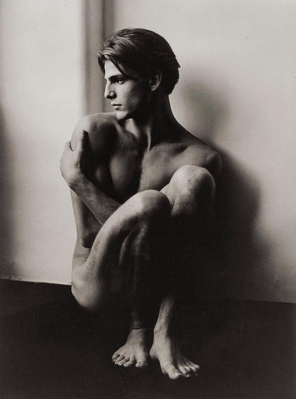 Stephano Seated, Milan - Photograph by Herb Ritts