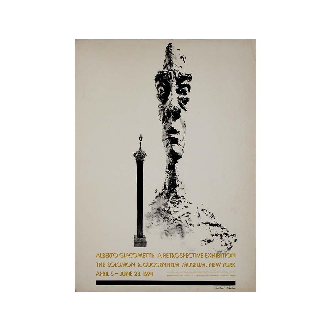 El cartel original de 1974 para la exposición retrospectiva de Alberto Giacometti en el Solomon R. Guggenheim Museum de Nueva York es una pieza extraordinaria que combina las bellas artes y un diseño gráfico magistral. Este póster, fotografiado y