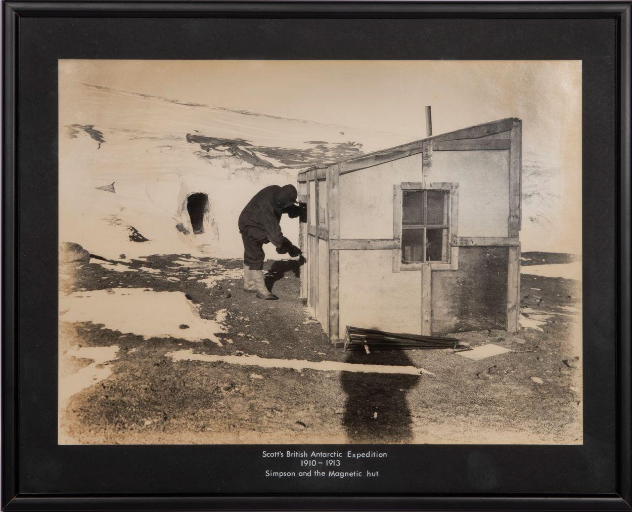 Herbert Ponting Black and White Photograph - Simpson and the Magnetic hut. 