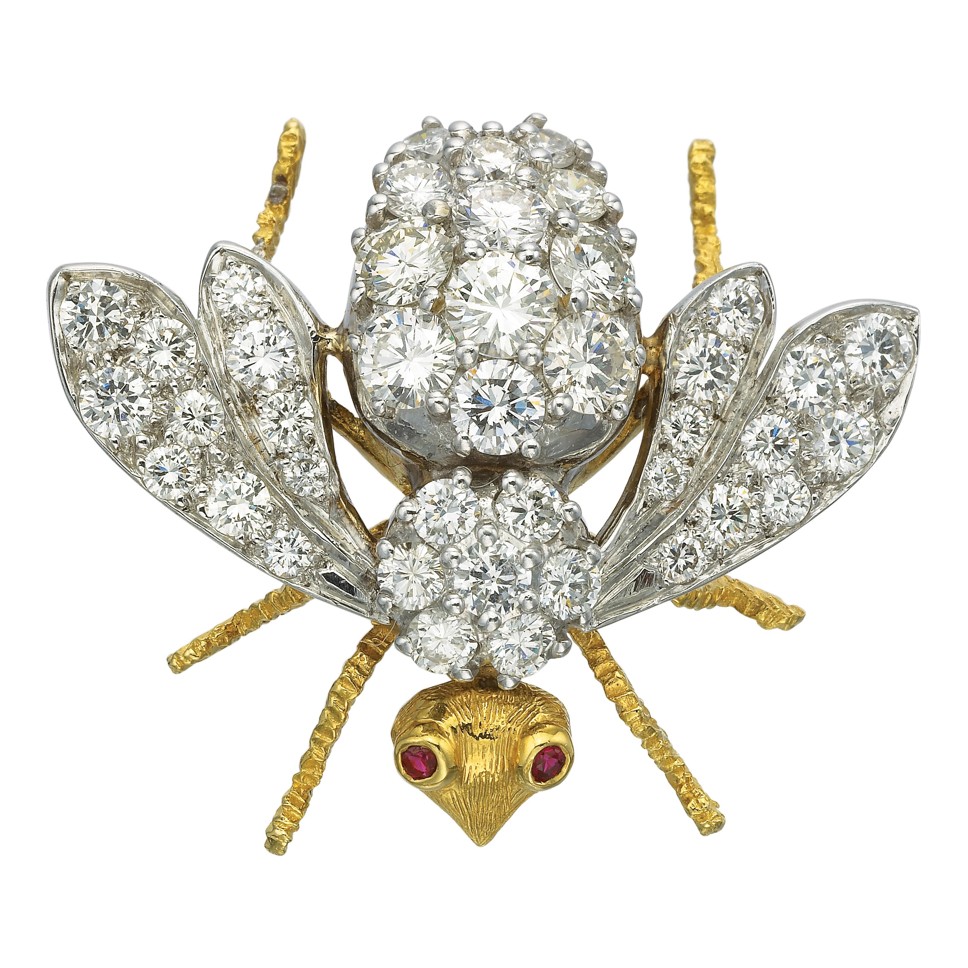Scintillating sparkles of 5.00 carats diamonds buzz into view on this Herbert Rosenthal masterpiece. Two graceful ruby eyes are set in an 18 karat yellow gold bee brooch. The body and wings are 18 carat white gold pave' set with 41 round brilliant