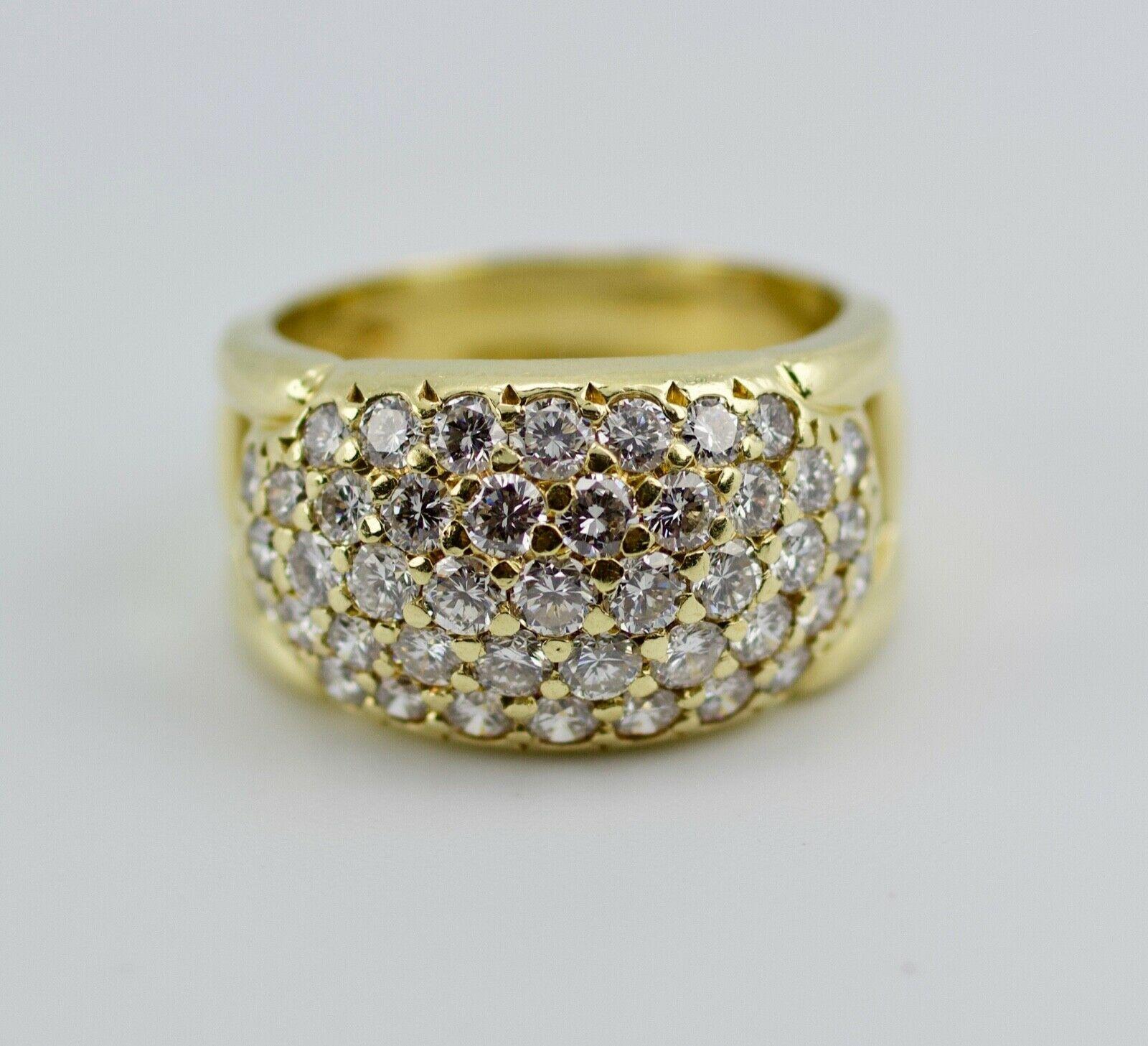 This is a stunning Herbert Rosenthal 18k yellow gold white round diamond  band. It is a size 6 and weighs in at 8.2 grams. These diamonds are white brilliant cut diamonds that add up to 1.50 carats total weight. They are D-E color and VS1-VS2