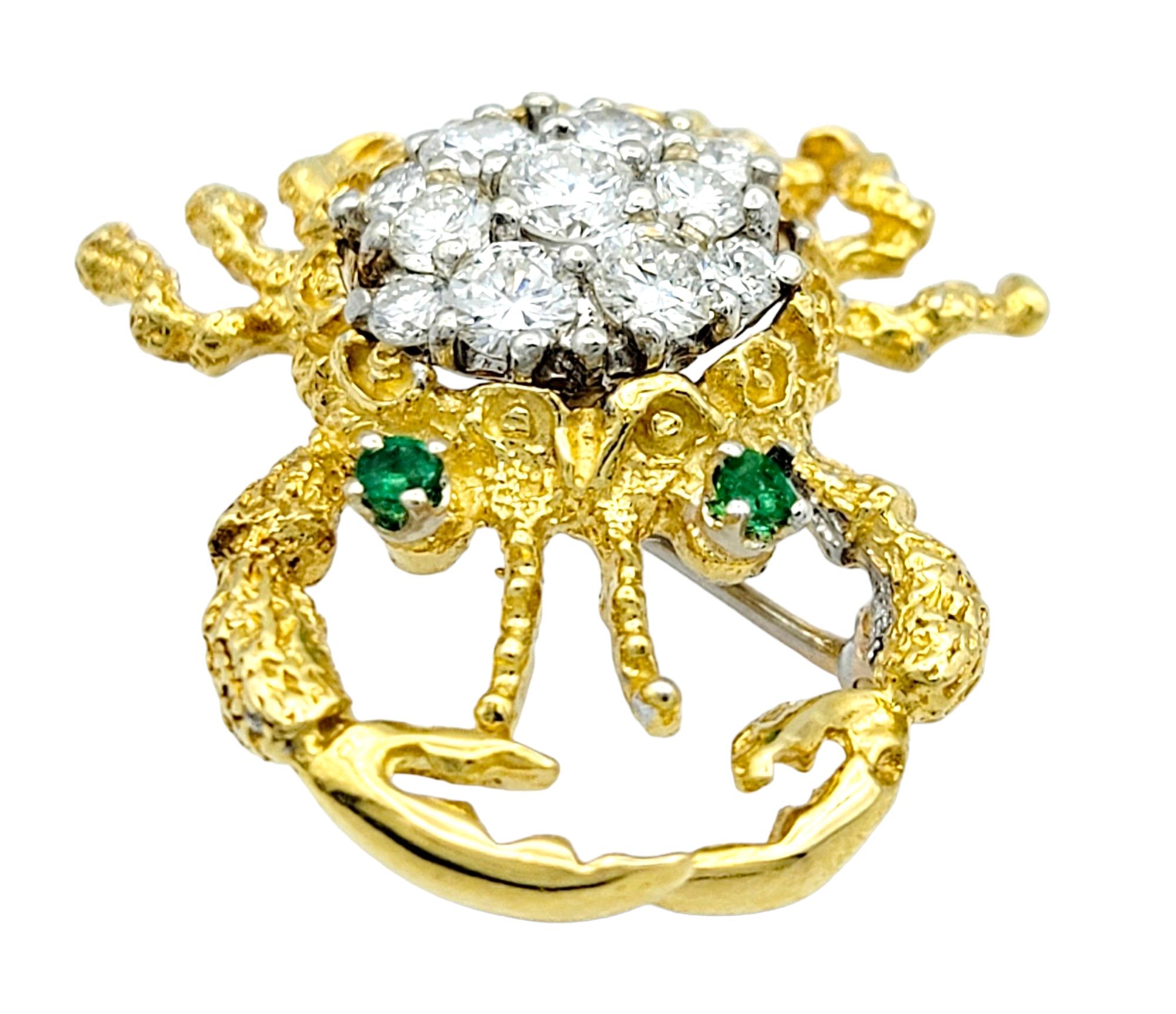 This stunning designer crab brooch, set in radiant 18 karat yellow gold, is a true testament to both artistry and elegance. The body of the crab is adorned with a brilliant cluster of diamonds, creating a captivating spectacle that mimics the