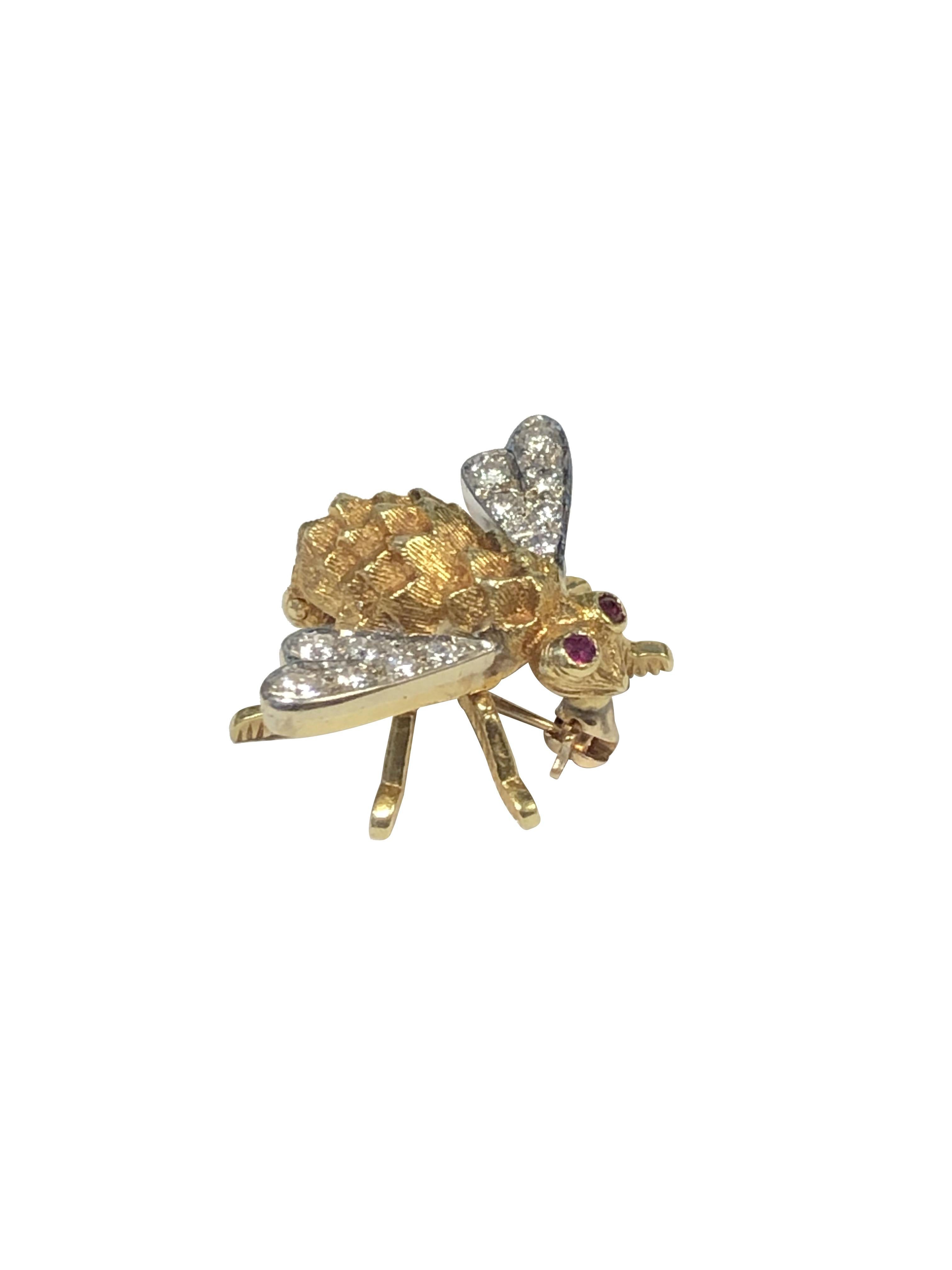 Circa 1970 Herbert Rosenthal  18k Yellow Gold Bee Brooch, measuring 1 inch from Wing tip to tip 3/4 inch in length and weighing 6.4 Grams. The white gold top wings are set with Round Brilliant cut Diamonds totaling 1/4 carats, further set with Ruby