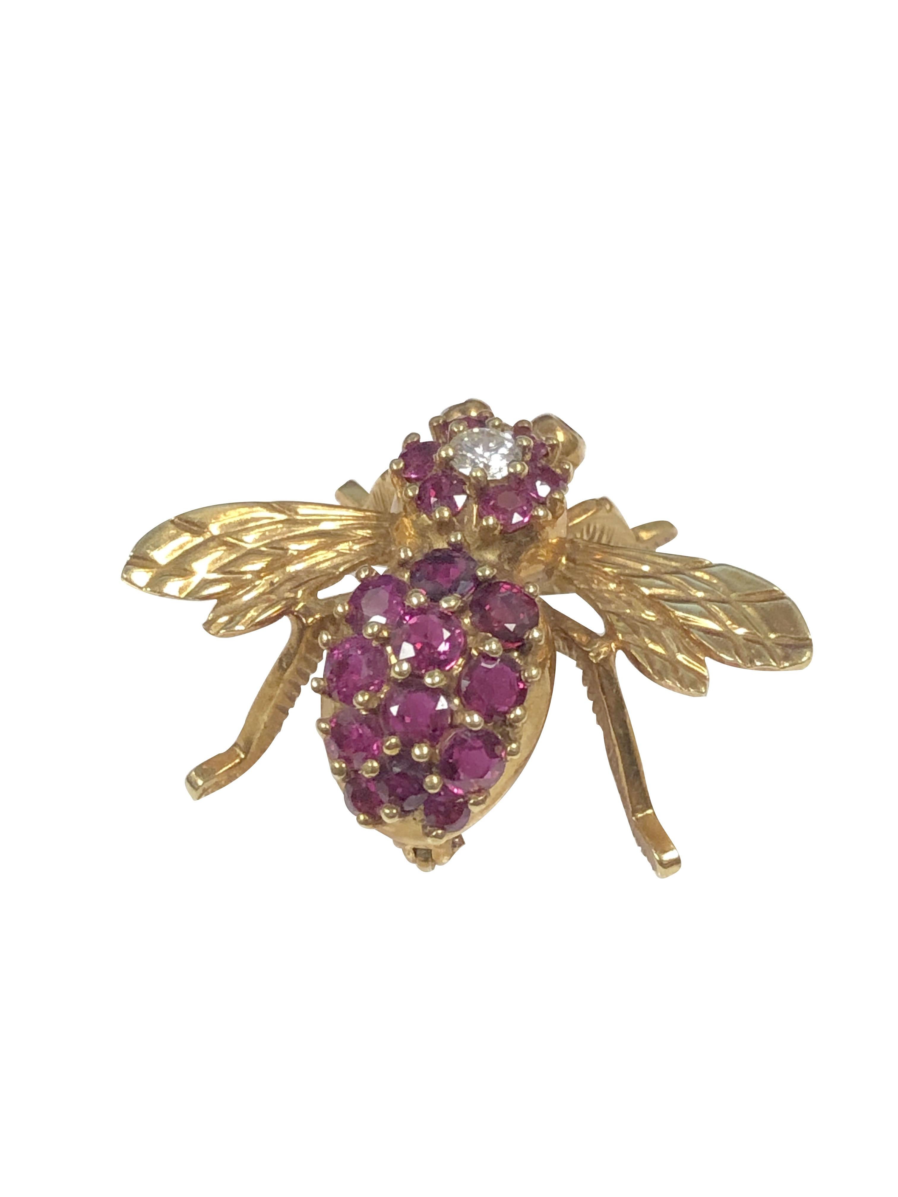 Circa 1980 Herbert Rosenthal 18K Yellow Gold Bee Brooch, measuring 1 inch in length and 1 1/4 inches wide from Wing tip to tip, finely detailed with Ruby Eyes and further set with Very Fine Color Rubies totaling 1 carat and centrally set with a