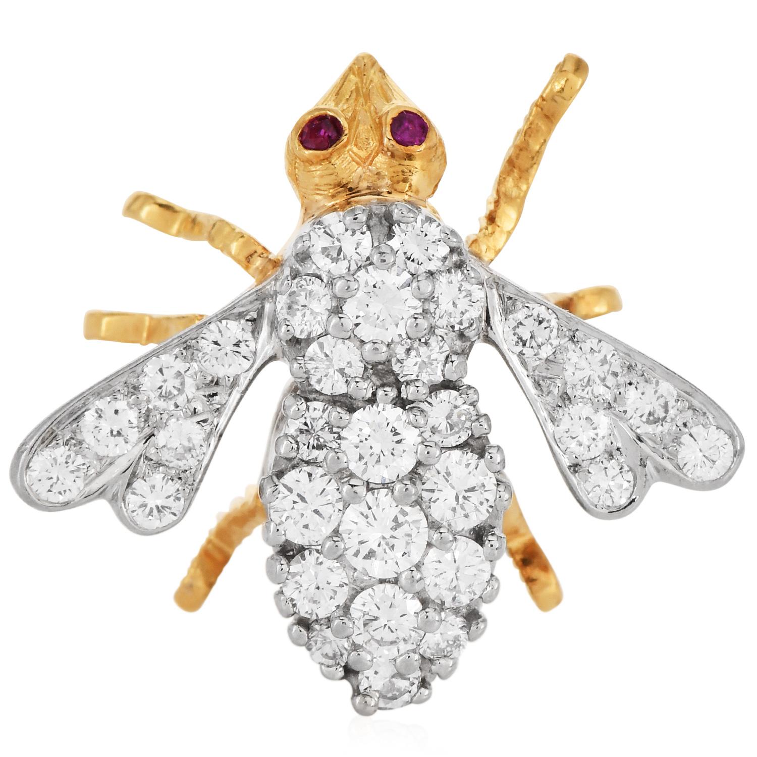 This charming Vintage 1970s bee pin by Herbert Rosenthal is set with some large genuine round diamonds weighing approx. 1.50 carats, G-H color, and VS Clarity, and two small rubies in the eyes approx. 0.02 carats. 

Rosenthal bees are