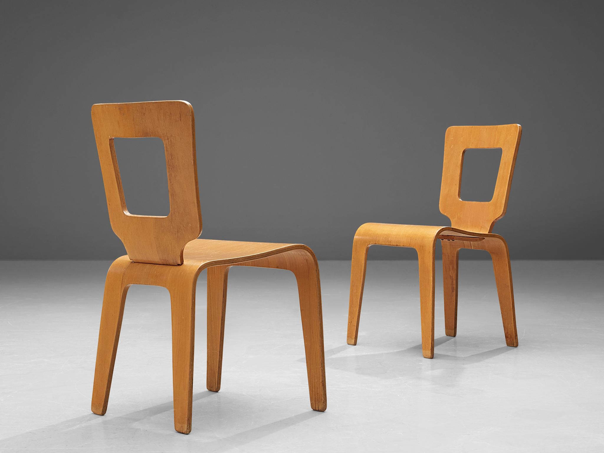 Herbert von Jordan for Thaden-Jordan Furniture Corporation, dining chairs, side chairs, plywood, United States, 1940s-1950s.

A pair of molded plywood side chairs by Herbert Von Jordan. He used building methods during the period of the 1940s that